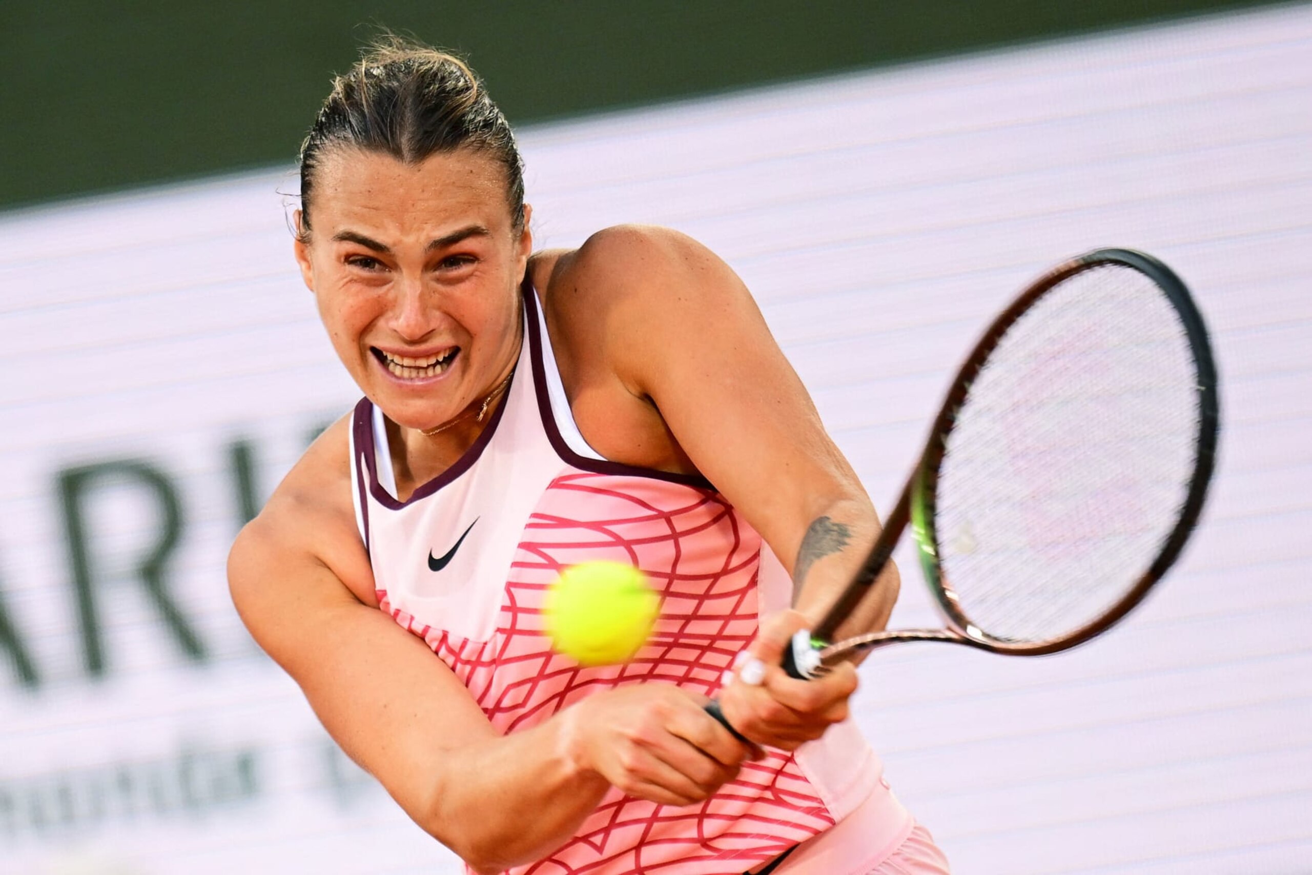 Belarus' Aryna Sabalenka plays a backhand return to US Sloane Stephens during their women's singles match on day eight of the Roland-Garros Open tennis tournament at the Court Philippe-Chatrier in Paris on June 4, 2023. (Photo by Emmanuel DUNAND / AFP) (Photo by EMMANUEL DUNAND/AFP via Getty Images)
