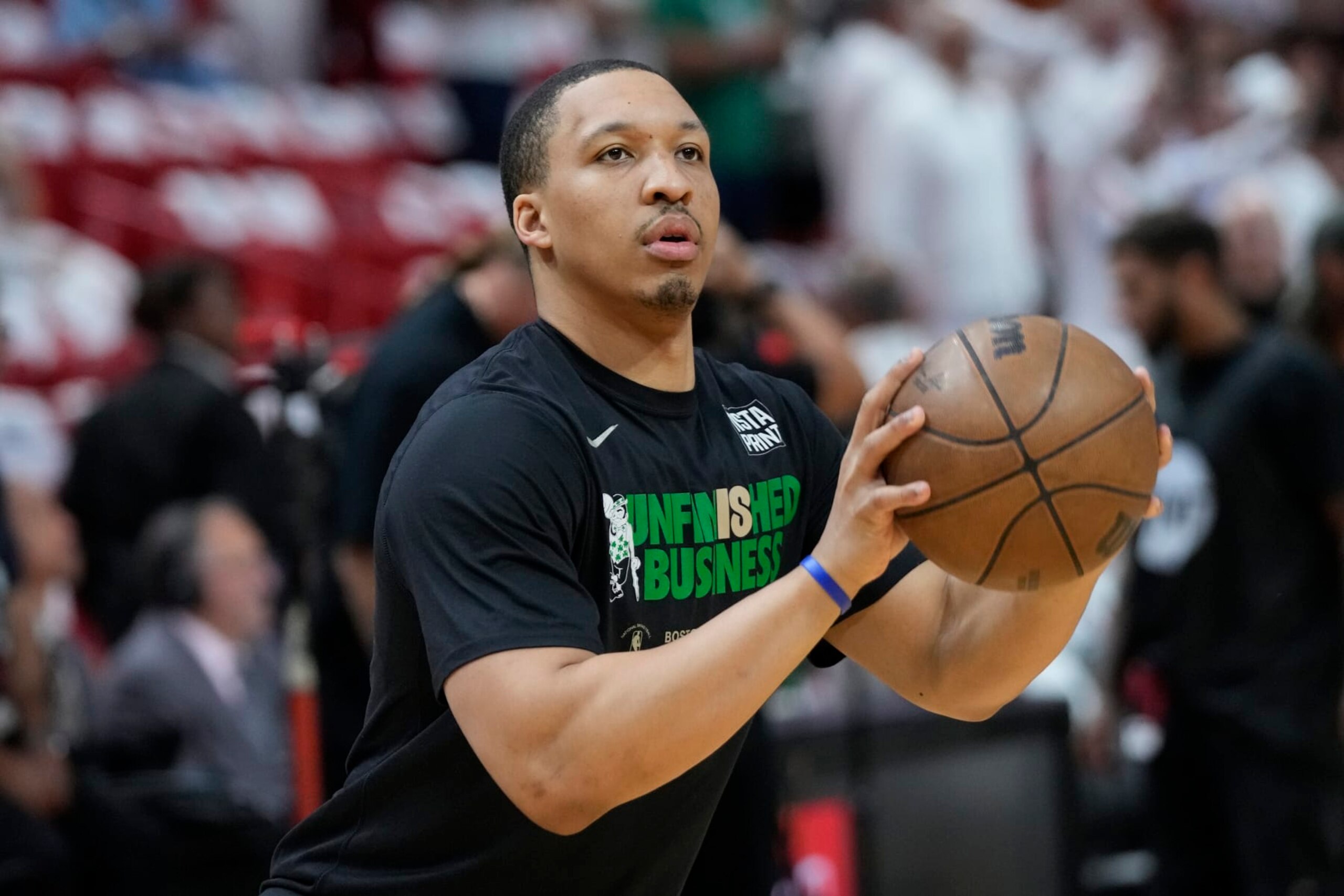 Boston Celtics forward Grant Williams (12) warms up before Game 4 of the NBA basketball playoffs Eastern Conference finals against the Miami Heat, Tuesday, May 23, 2023, in Miami. (AP Photo/Wilfredo Lee) Boston Celtics forward Grant Williams (12) warms up before Game 4 of the NBA basketball playoffs Eastern Conference finals against the Miami Heat, Tuesday, May 23, 2023, in Miami. (AP Photo/Wilfredo Lee)