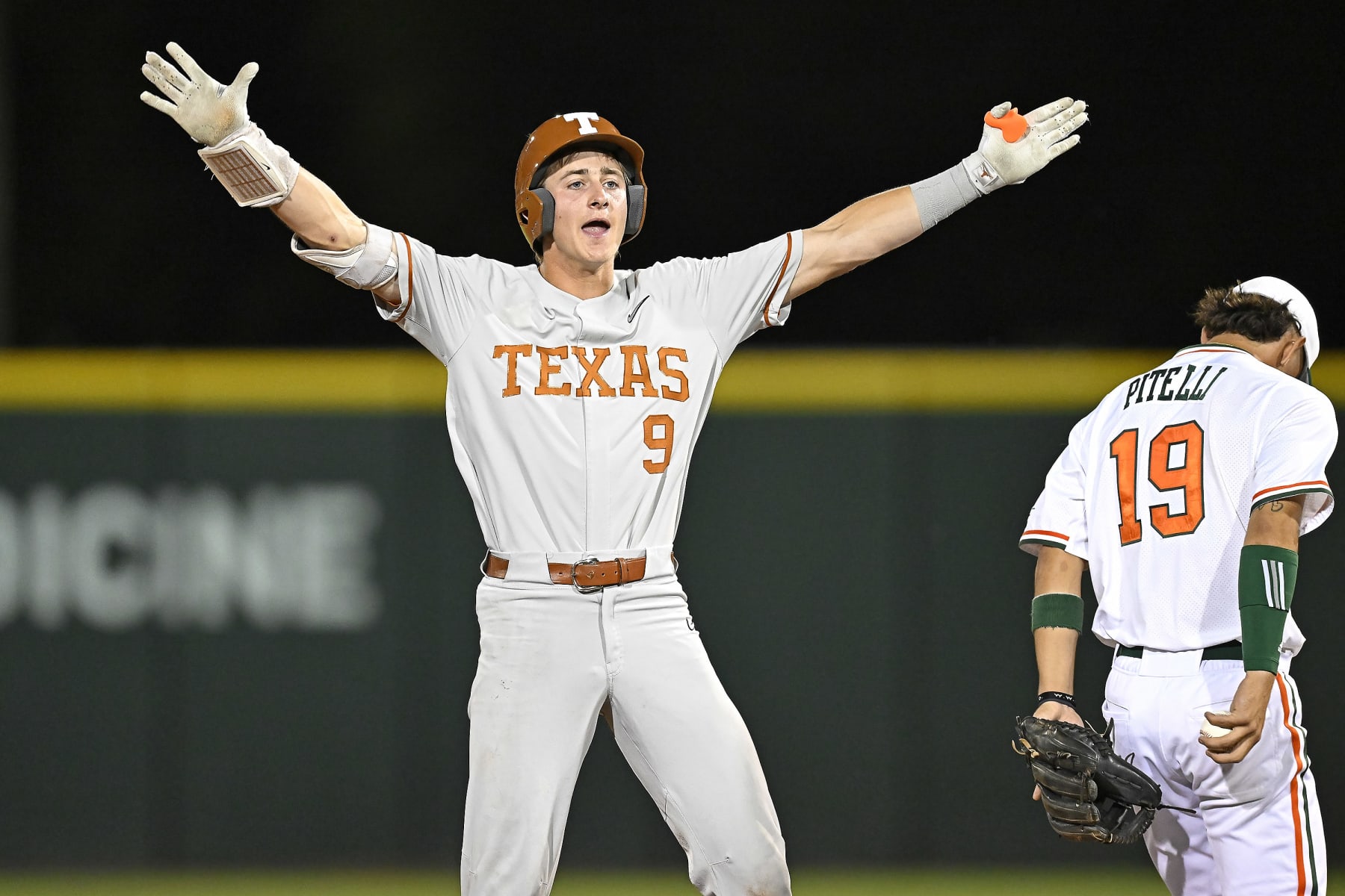 CORAL GABLES, FL - JUNE 03: Texas infielder/outfielder Jared Thomas (9) celebrates after hitting a lead-off double in the first inning as the Miami Hurricanes faced the Texas Longhorns in the Coral Gables Regional on June 3, 2023, at Mark Light Field at Alex Rodriguez Park in Coral Gables, Florida. (Photo by Samuel Lewis/Icon Sportswire via Getty Images)