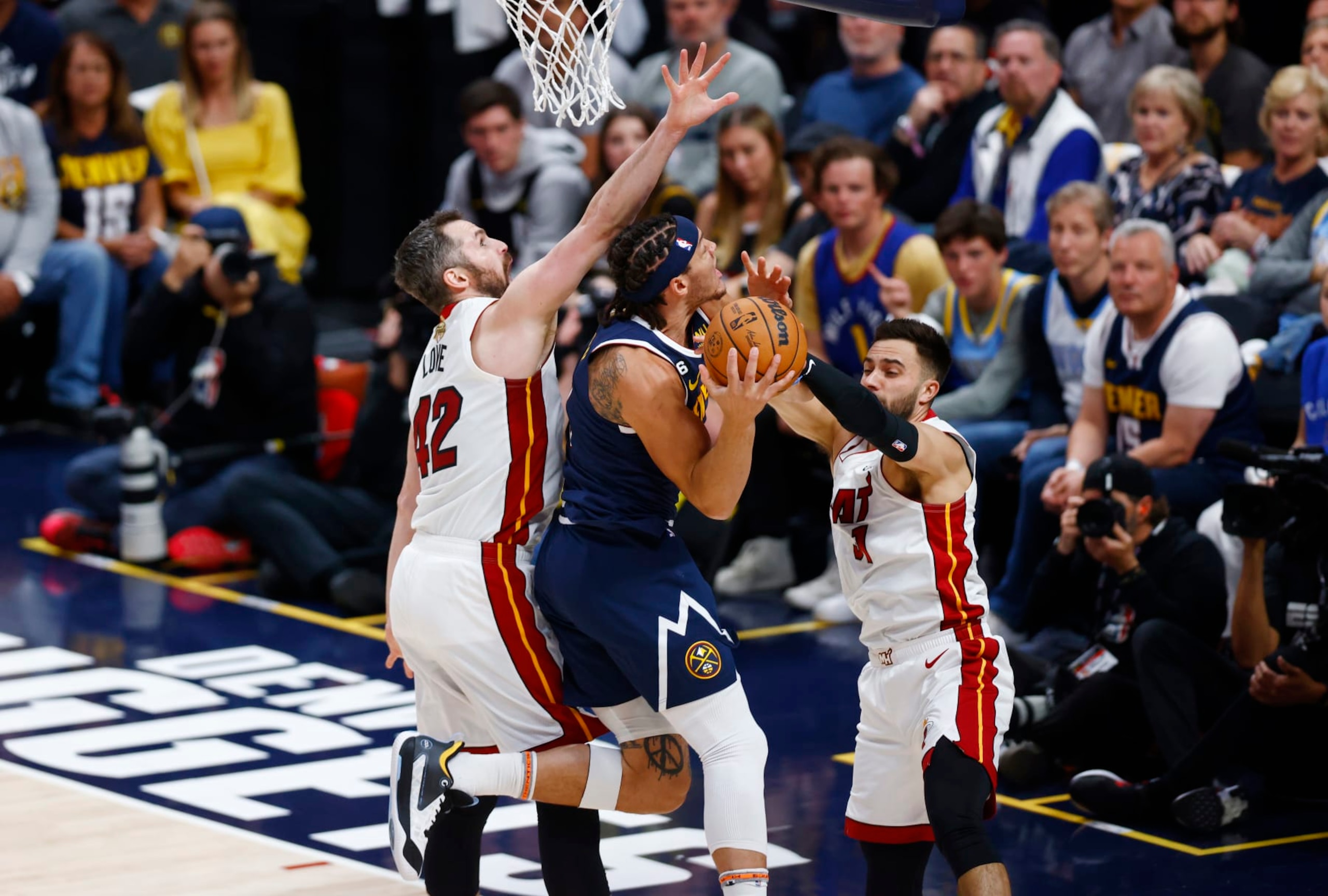 Kevin Love, Aaron Gordon and Max Strus