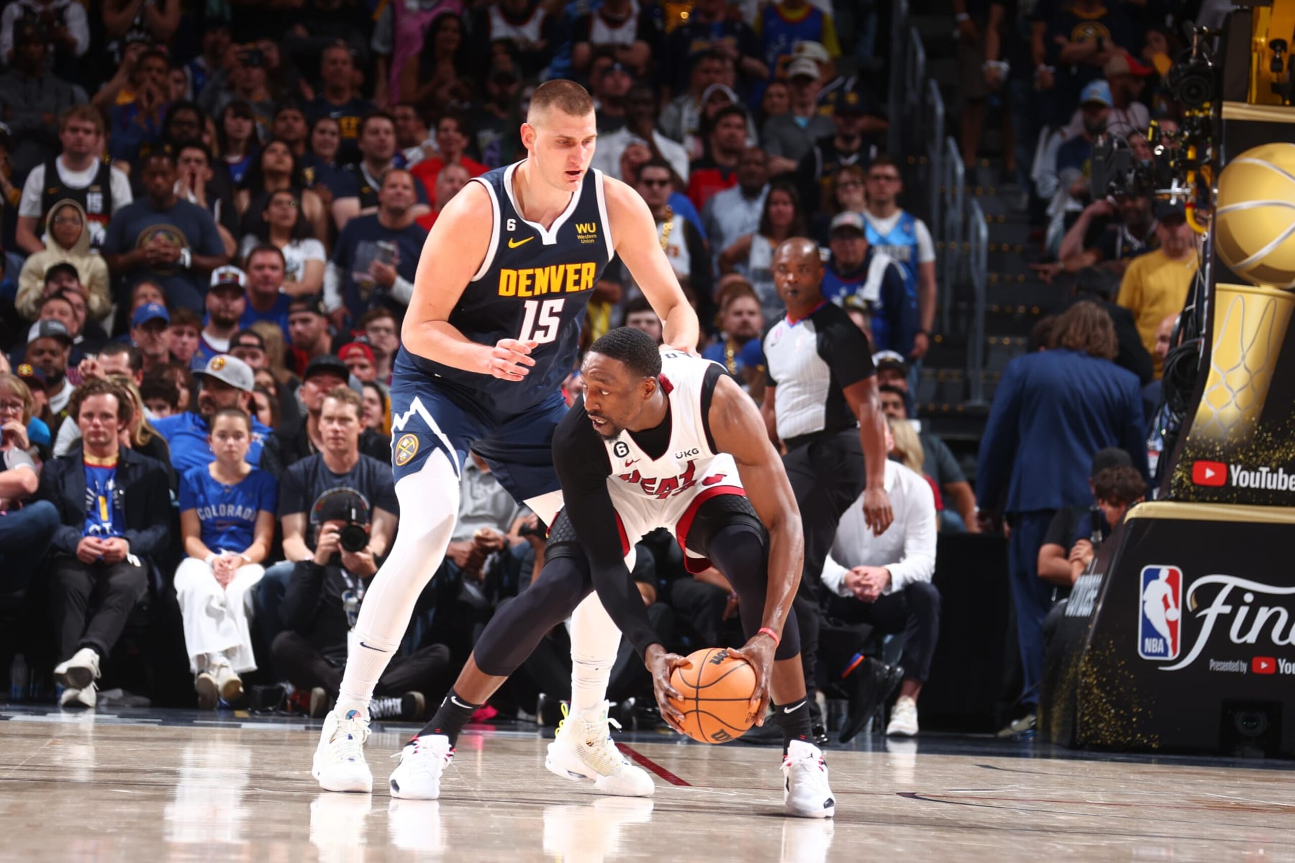 DENVER, CO - JUNE 4: Nikola Jokic #15 of the Denver Nuggets plays defense during Game Two of the 2023 NBA Finals against Bam Adebayo #13 of the Miami Heat on June 4, 2023 at the Ball Arena in Denver, Colorado. NOTE TO USER: User expressly acknowledges and agrees that, by downloading and/or using this Photograph, user is consenting to the terms and conditions of the Getty Images License Agreement. Mandatory Copyright Notice: Copyright 2023 NBAE (Photo by Nathaniel S. Butler/NBAE via Getty Images)