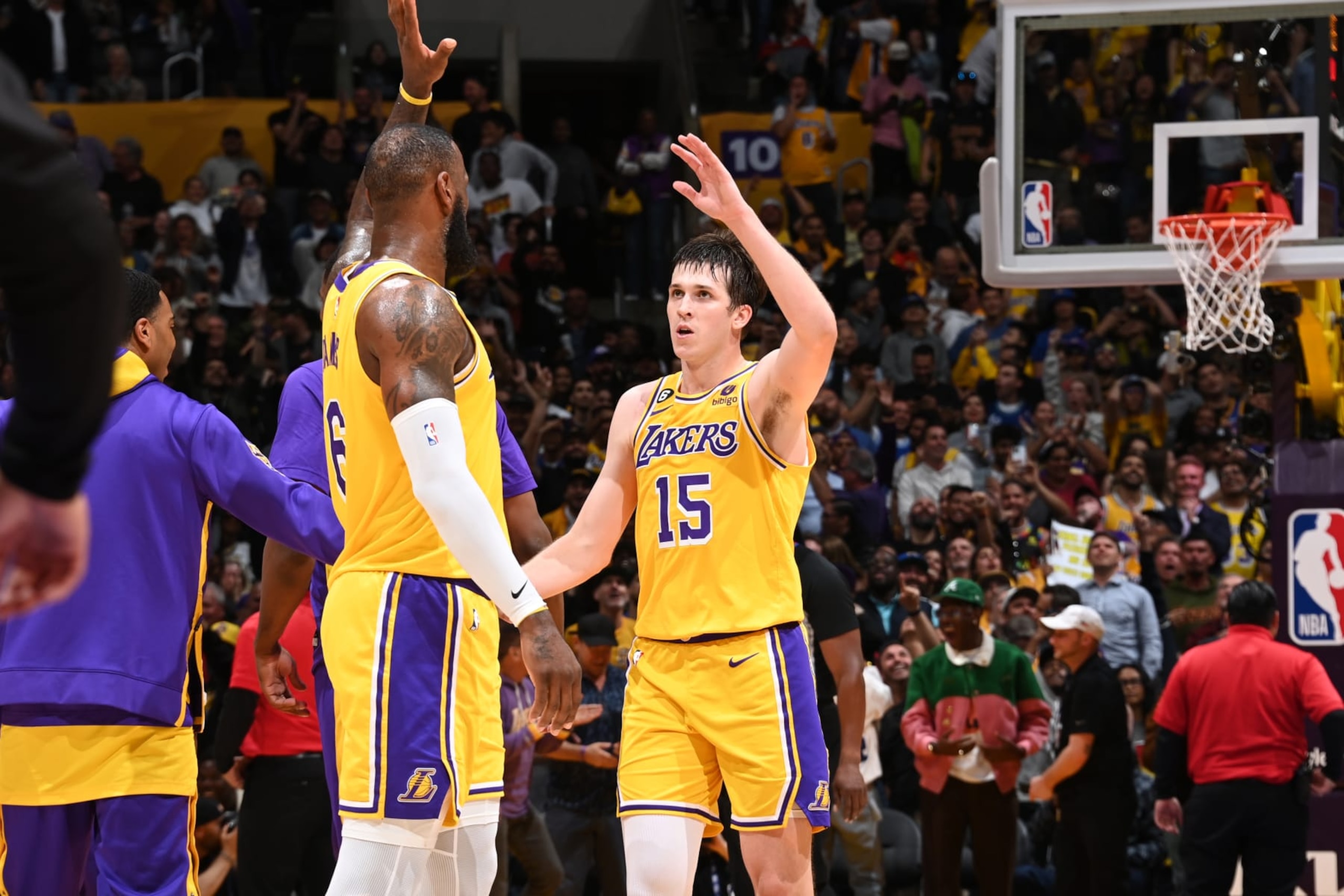 LOS ANGELES, CA - MAY 12: LeBron James #6 of the Los Angeles Lakers high fives Austin Reaves #15 during Game 6 of the Western Conference Semi-Finals 2023 NBA Playoffs on May 12, 2023 at Crypto.Com Arena in Los Angeles, California. NOTE TO USER: User expressly acknowledges and agrees that, by downloading and/or using this Photograph, user is consenting to the terms and conditions of the Getty Images License Agreement. Mandatory Copyright Notice: Copyright 2023 NBAE (Photo by Andrew D. Bernstein/NBAE via Getty Images)
