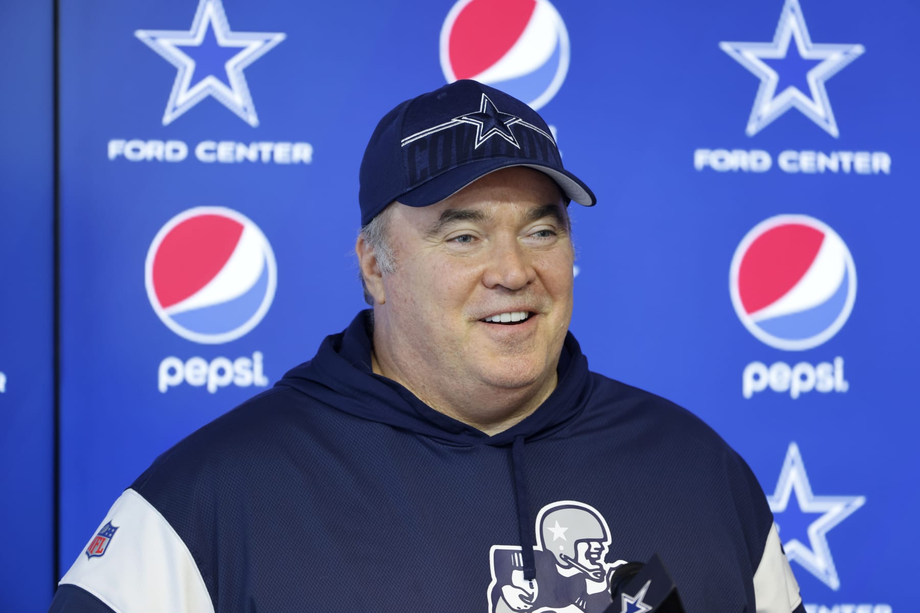 Dallas Cowboys head coach Mike McCarthy talks to the media prior to NFL football practice at the team's training facility in Frisco, Texas, Thursday, May 25, 2023. (AP Photo/Michael Ainsworth)