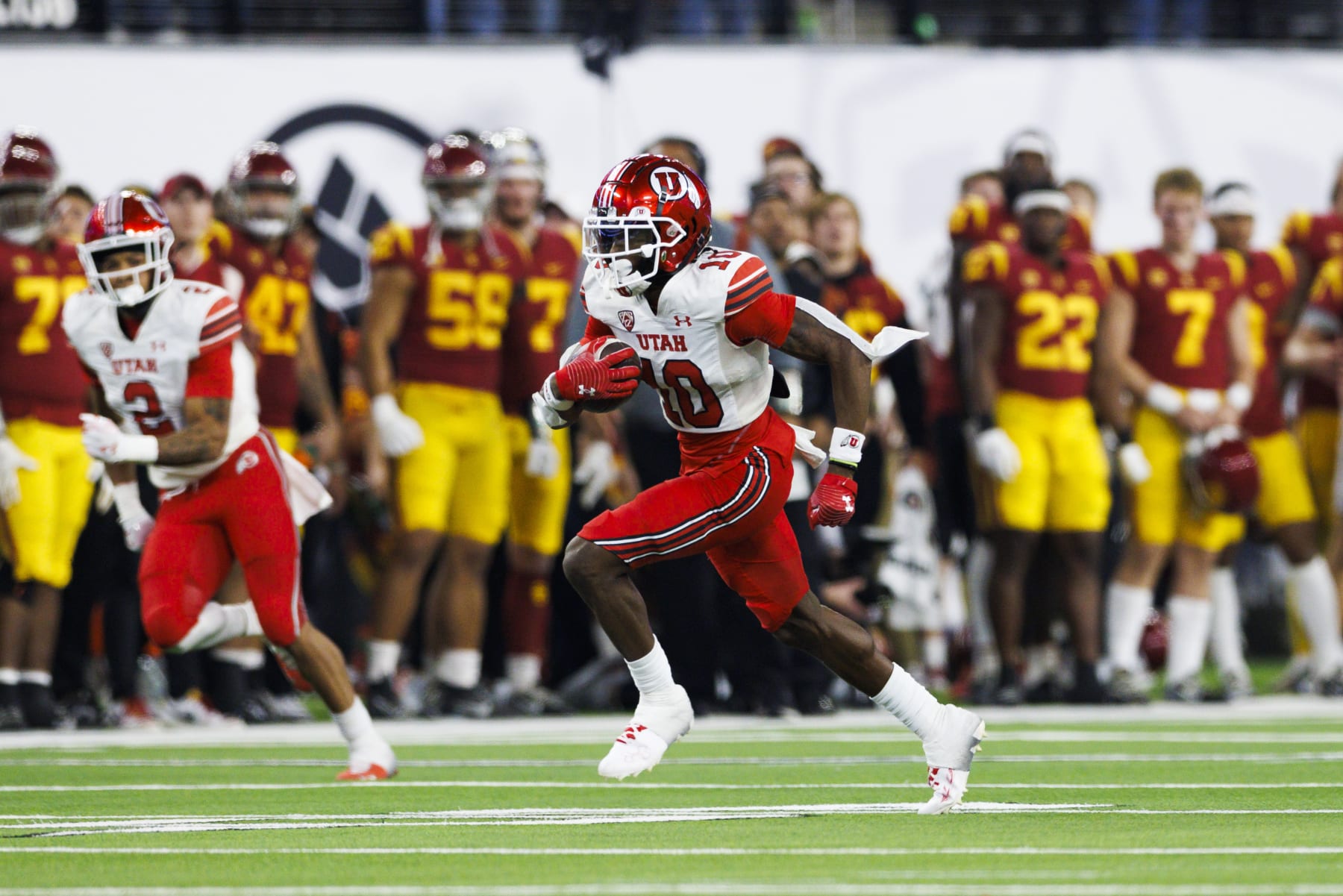 LAS VEGAS, NV - DECEMBER 02: Utah Utes wide receiver Money Parks (10) runs after the catch during the Pac-12 Championship football game between Utah Utes and USC Trojans on December 2, 2022 at Allegiant Stadium in Las Vegas, NV. (Photo by Ric Tapia/Icon Sportswire via Getty Images)
