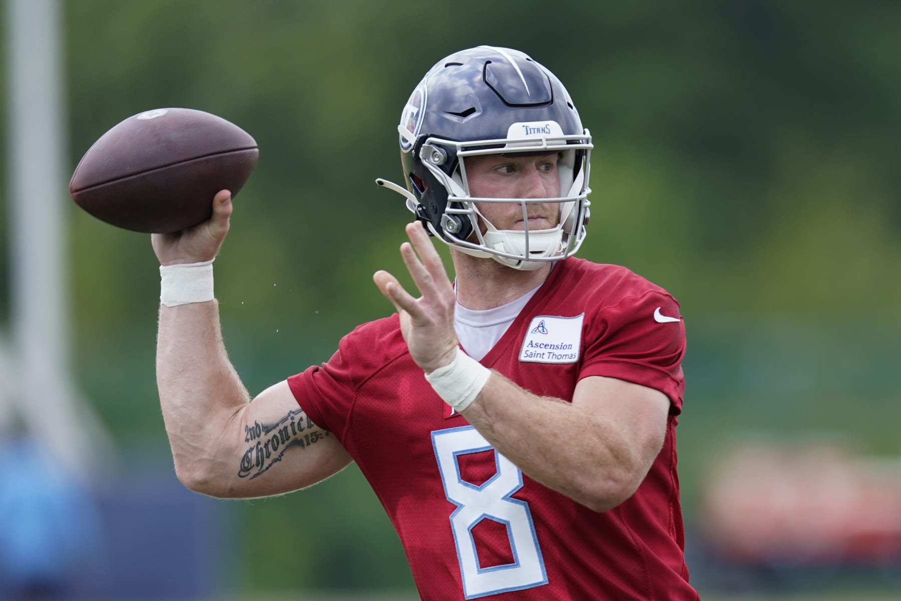 Tennessee Titans quarterback Will Levis (8) throws a pass during NFL football practice Wednesday, May 31, 2023, in Nashville, Tenn. (AP Photo/George Walker IV)