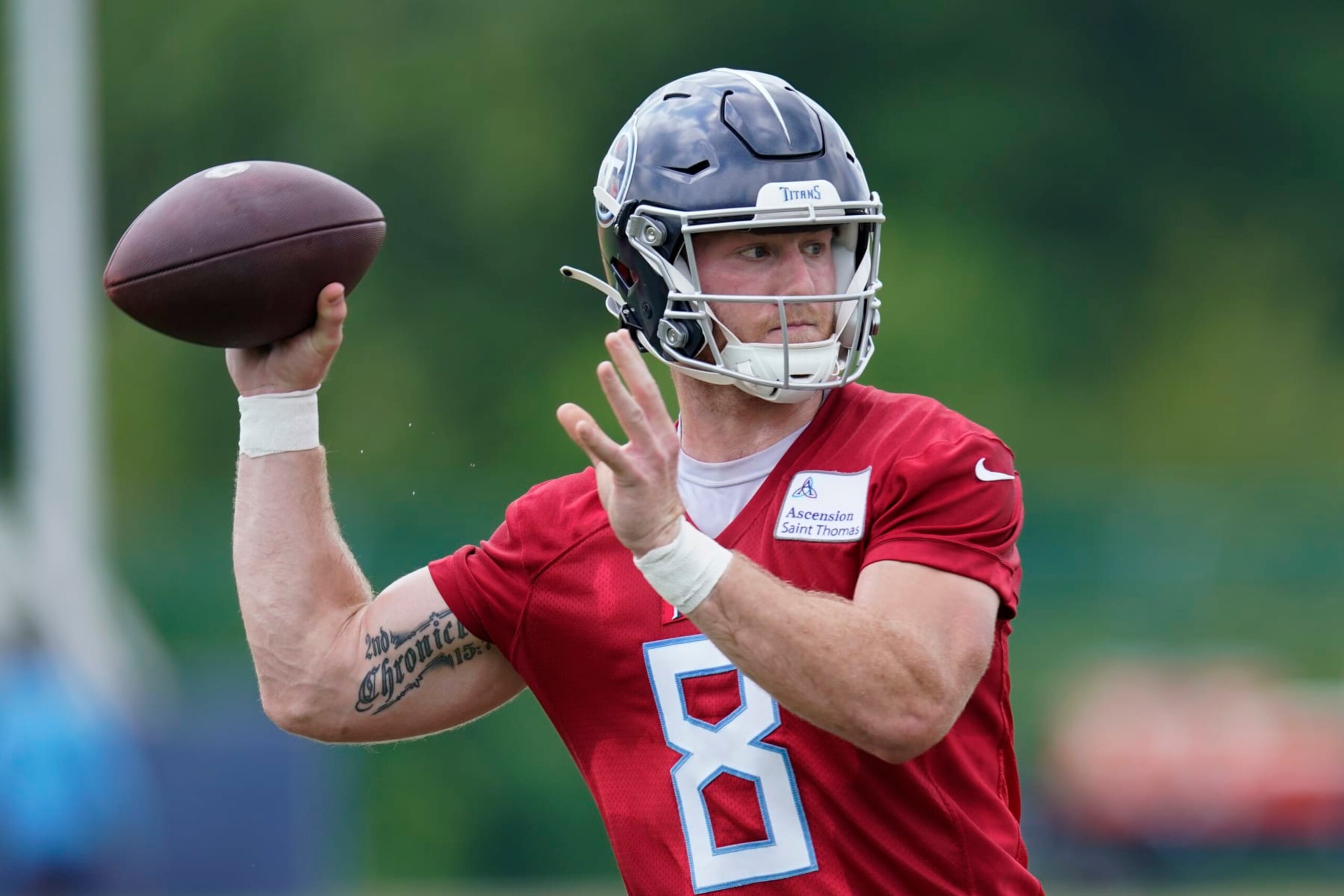 Tennessee Titans quarterback Will Levis (8) throws a pass during NFL football practice Wednesday, May 31, 2023, in Nashville, Tenn. (AP Photo/George Walker IV)