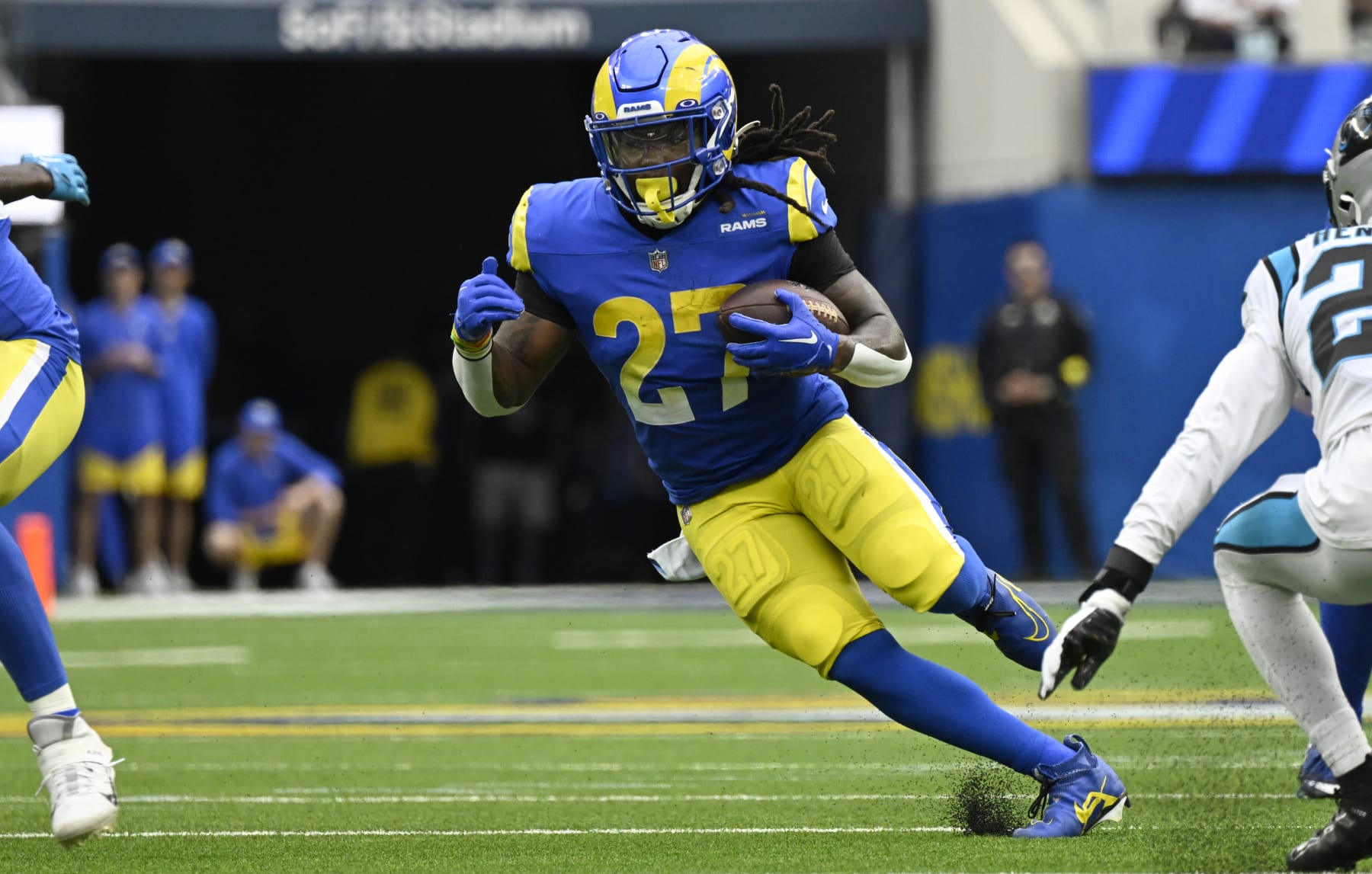 INGLEWOOD, CA - OCTOBER 16: Darrell Henderson Jr. #27 of the Los Angeles Rams runs the ball while playing the Carolina Panthers at SoFi Stadium on October 16, 2022 in Inglewood, California. (Photo by John McCoy/Getty Images)