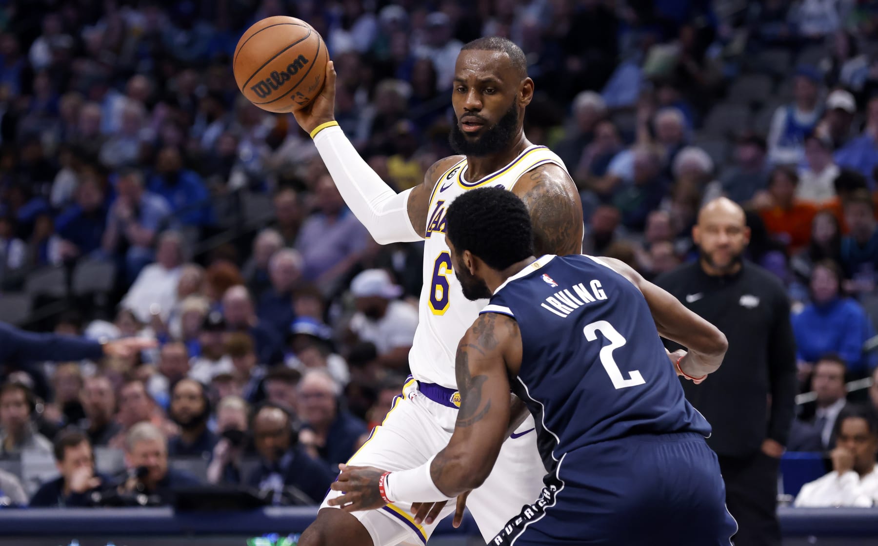 DALLAS, TX - FEBRUARY 26 : LeBron James #6 of the Los Angeles Lakers handles the ball as Kyrie Irving #2 of the Dallas Mavericks defends in the second half at American Airlines Center on February 26, 2023 in Dallas, Texas. The Lakers won 111-108. NOTE TO USER: User expressly acknowledges and agrees that, by downloading and or using this photograph, User is consenting to the terms and conditions of the Getty Images License Agreement. (Photo by Ron Jenkins/Getty Images)