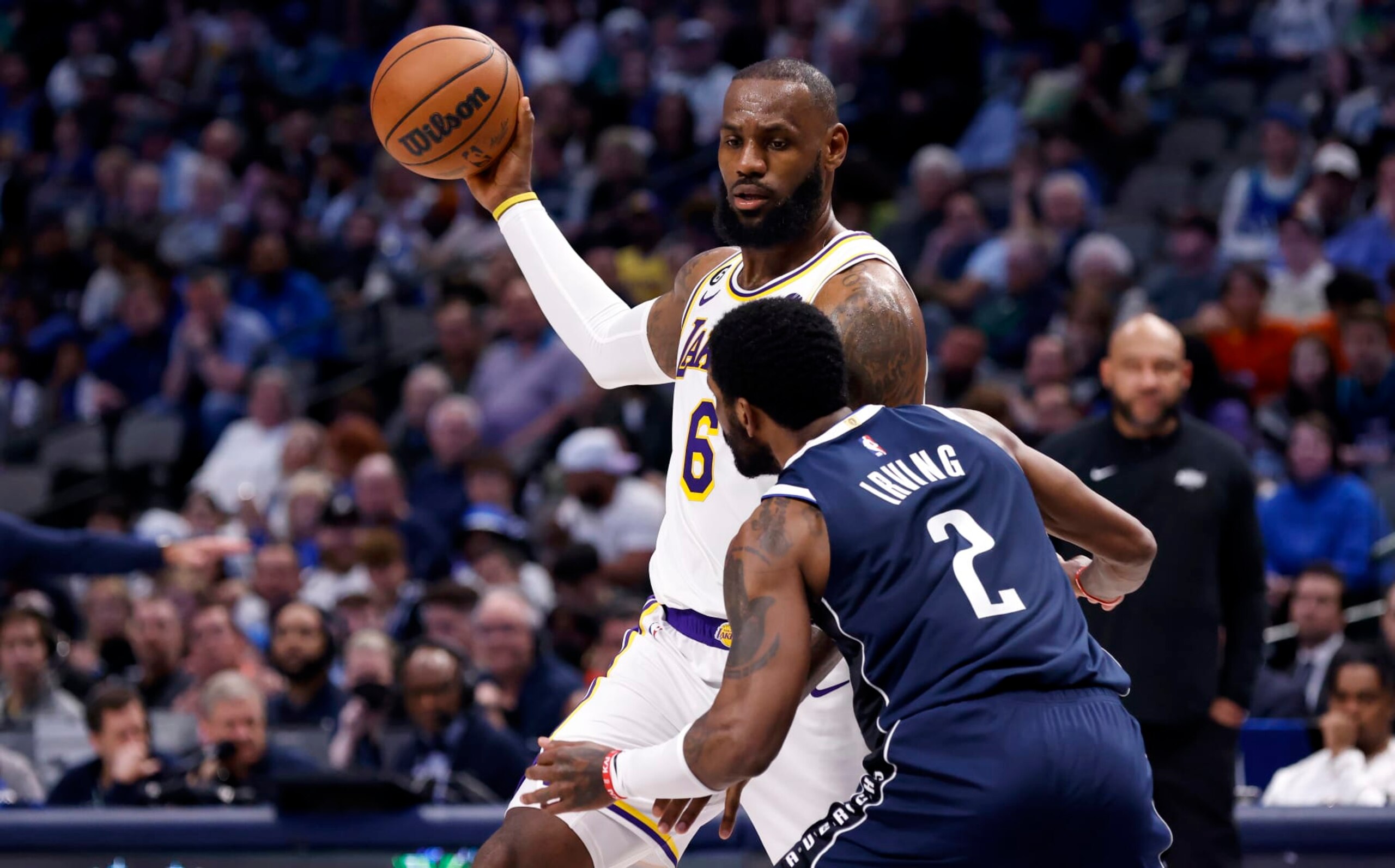 DALLAS, TX - FEBRUARY 26 : LeBron James #6 of the Los Angeles Lakers handles the ball as Kyrie Irving #2 of the Dallas Mavericks defends in the second half at American Airlines Center on February 26, 2023 in Dallas, Texas. The Lakers won 111-108. NOTE TO USER: User expressly acknowledges and agrees that, by downloading and or using this photograph, User is consenting to the terms and conditions of the Getty Images License Agreement. (Photo by Ron Jenkins/Getty Images)