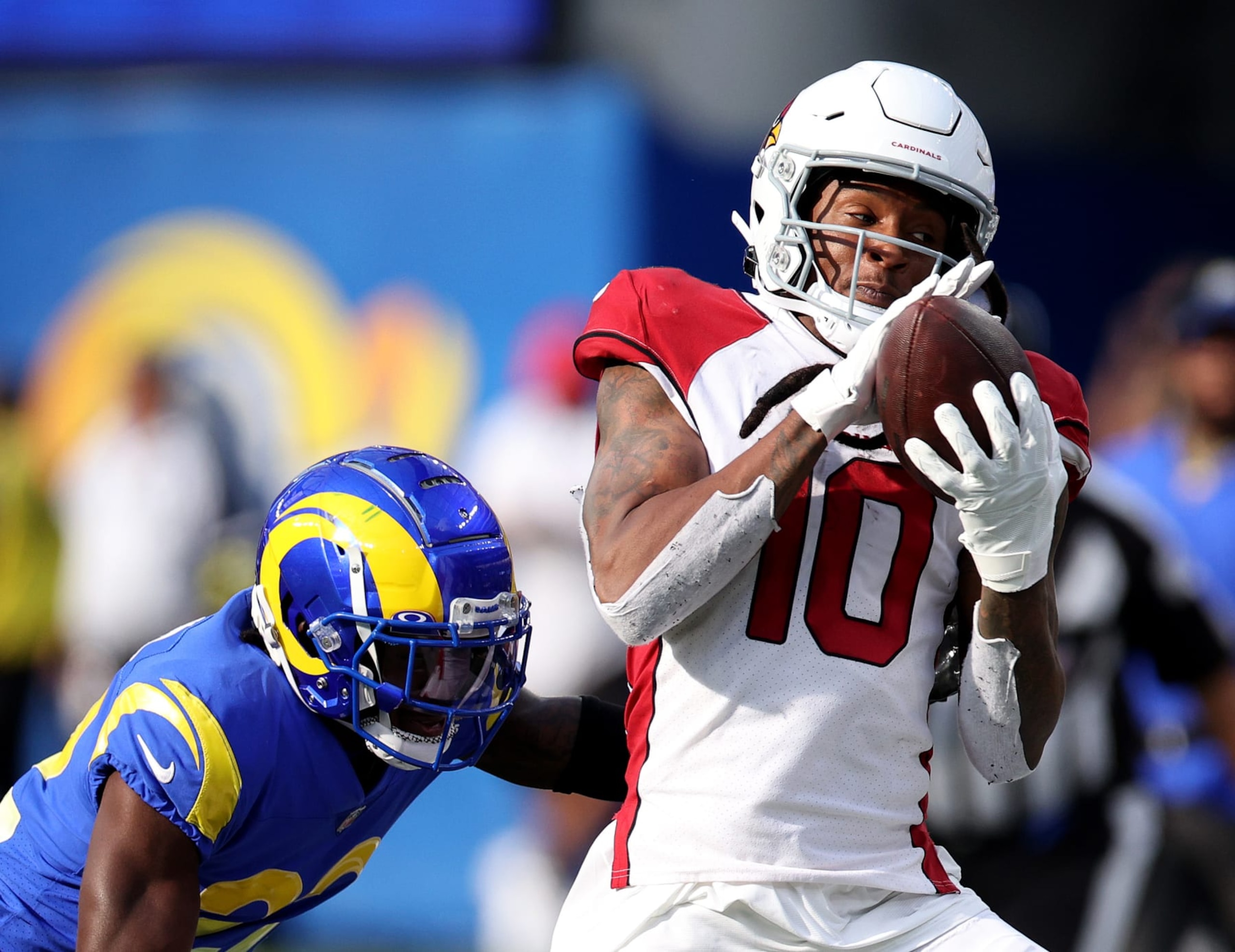 INGLEWOOD, CALIFORNIA - NOVEMBER 13: DeAndre Hopkins #10 of the Arizona Cardinals makes a catch in front of David Long Jr. #22 of the Los Angeles Rams during a 27-17 win at SoFi Stadium on November 13, 2022 in Inglewood, California. (Photo by Harry How/Getty Images)