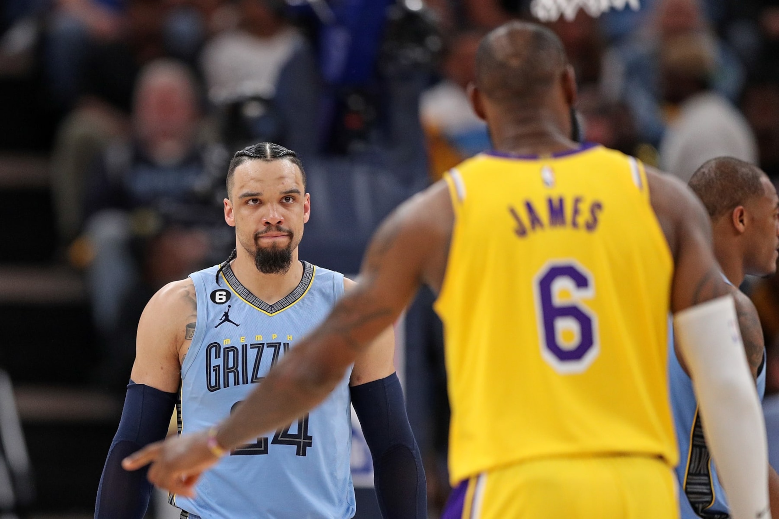 MEMPHIS, TENNESSEE - APRIL 26: Dillon Brooks #24 of the Memphis Grizzlies looks at LeBron James #6 of the Los Angeles Lakers during the second half of Game Five of the Western Conference First Round Playoffs at FedExForum on April 26, 2023 in Memphis, Tennessee. NOTE TO USER: User expressly acknowledges and agrees that, by downloading and or using this photograph, User is consenting to the terms and conditions of the Getty Images License Agreement. (Photo by Justin Ford/Getty Images)
