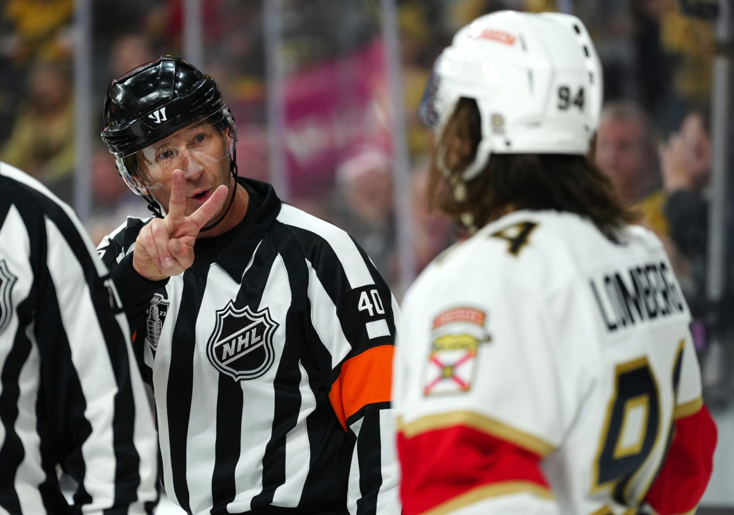 LAS VEGAS, NEVADA - JUNE 05: Referee Steve Kozari #40 gestures to Ryan Lomberg #94 of the Florida Panthers during the second period against the Vegas Golden Knights in Game Two of the 2023 NHL Stanley Cup Final at T-Mobile Arena on June 05, 2023 in Las Vegas, Nevada. (Photo by Jeff Bottari/NHLI via Getty Images)