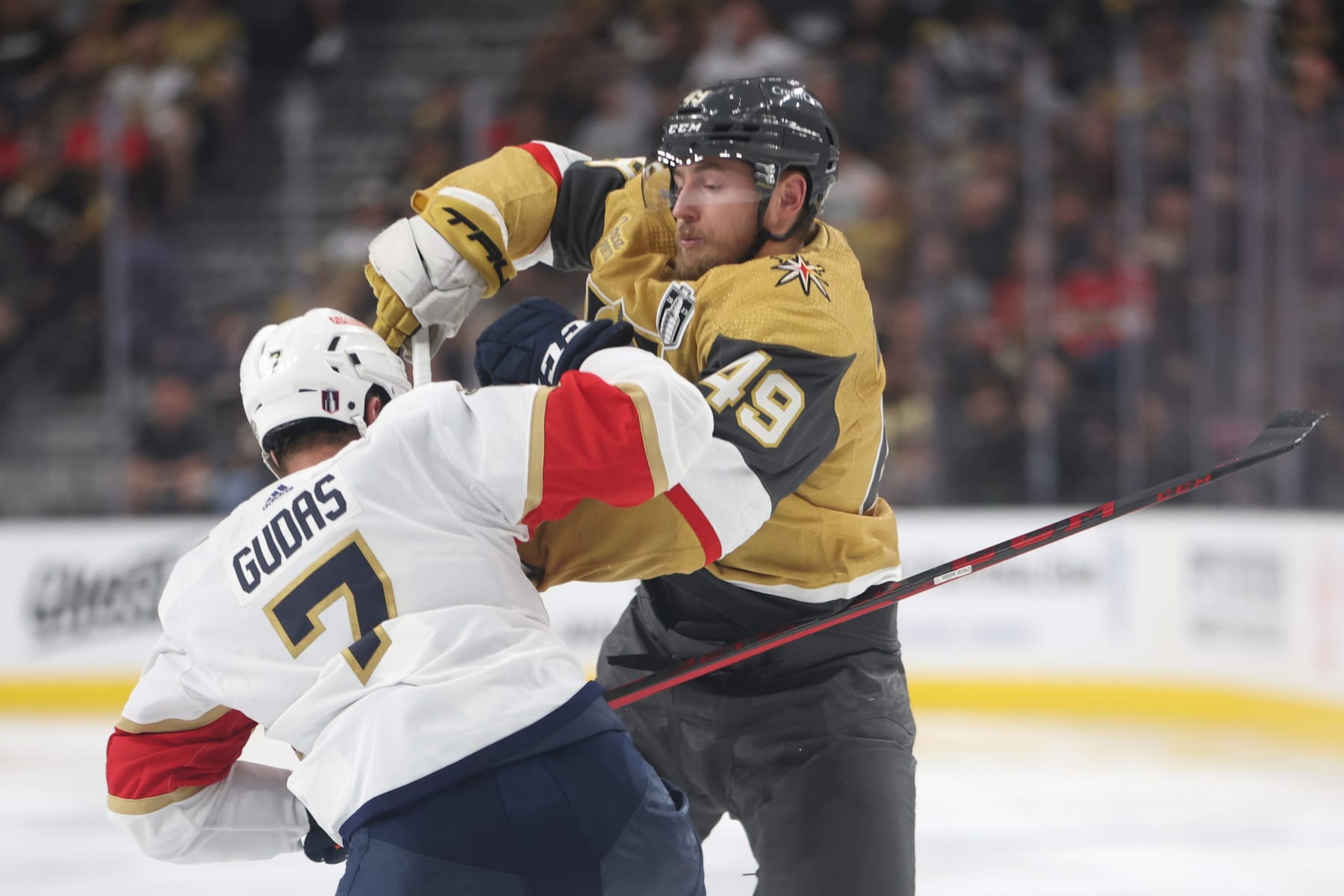 LAS VEGAS, NEVADA - JUNE 03:  Ivan Barbashev #49 of the Vegas Golden Knights gets tangled up with Radko Gudas #7 of the Florida Panthers during the third period in Game One of the 2023 NHL Stanley Cup Final at T-Mobile Arena on June 03, 2023 in Las Vegas, Nevada. (Photo by Sean M. Haffey/Getty Images)