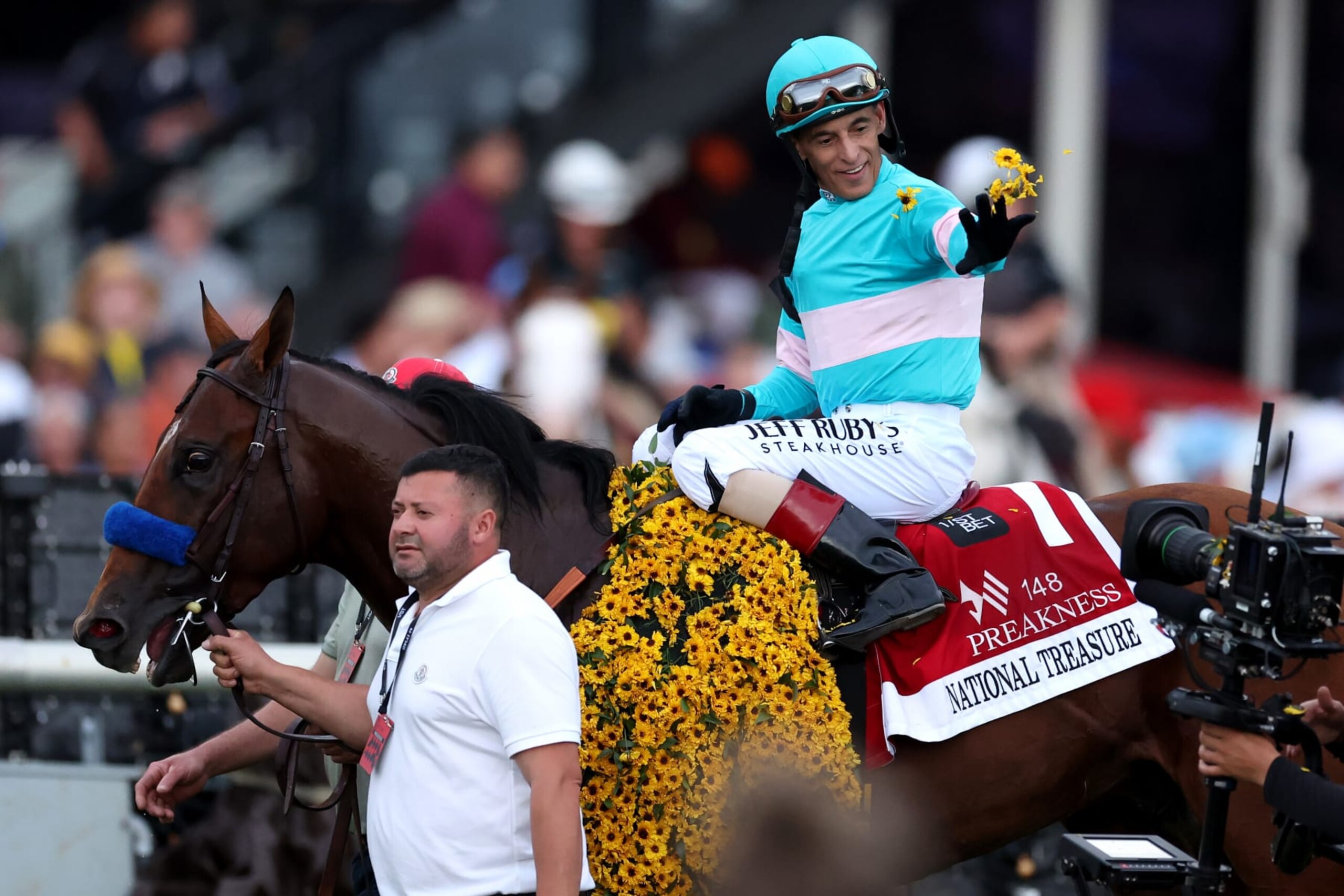 BALTIMORE, MARYLAND - MAY 20: Jockey John Velazquez #1 celebrates aboard National Treasure after winning the 148th Running of the Preakness Stakes at Pimlico Race Course on May 20, 2023 in Baltimore, Maryland. (Photo by Rob Carr/Getty Images)