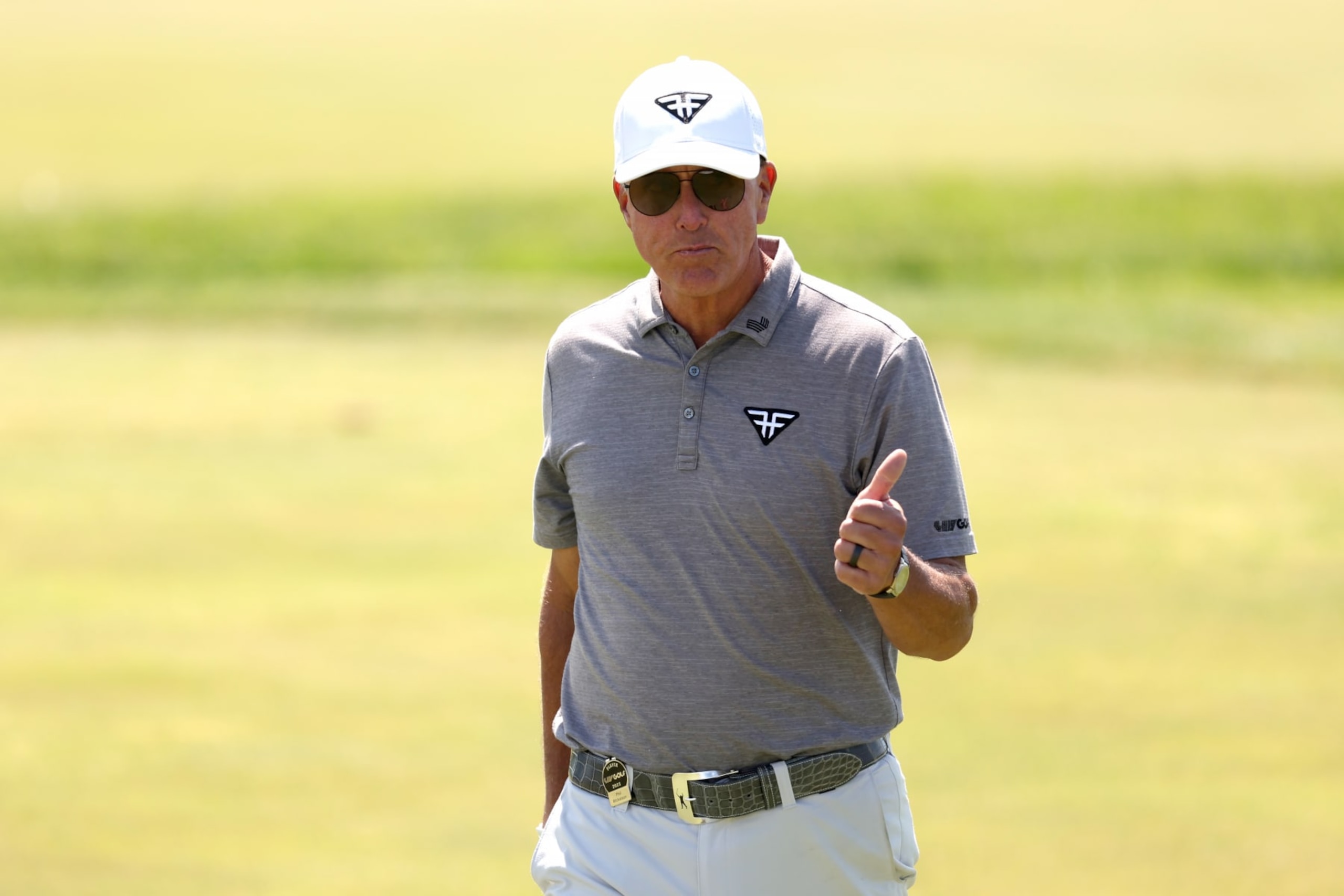 STERLING, VIRGINIA - MAY 26: Phil Mickelson of HyFlyers GC gives the thumbs up while walking to the ninth green during day one of the LIV Golf Invitational - DC at Trump National Golf Club on May 26, 2023 in Sterling, Virginia. (Photo by Rob Carr/Getty Images) STERLING, VIRGINIA - MAY 26: Phil Mickelson of HyFlyers GC gives the thumbs up while walking to the ninth green during day one of the LIV Golf Invitational - DC at Trump National Golf Club on May 26, 2023 in Sterling, Virginia. (Photo by Rob Carr/Getty Images)