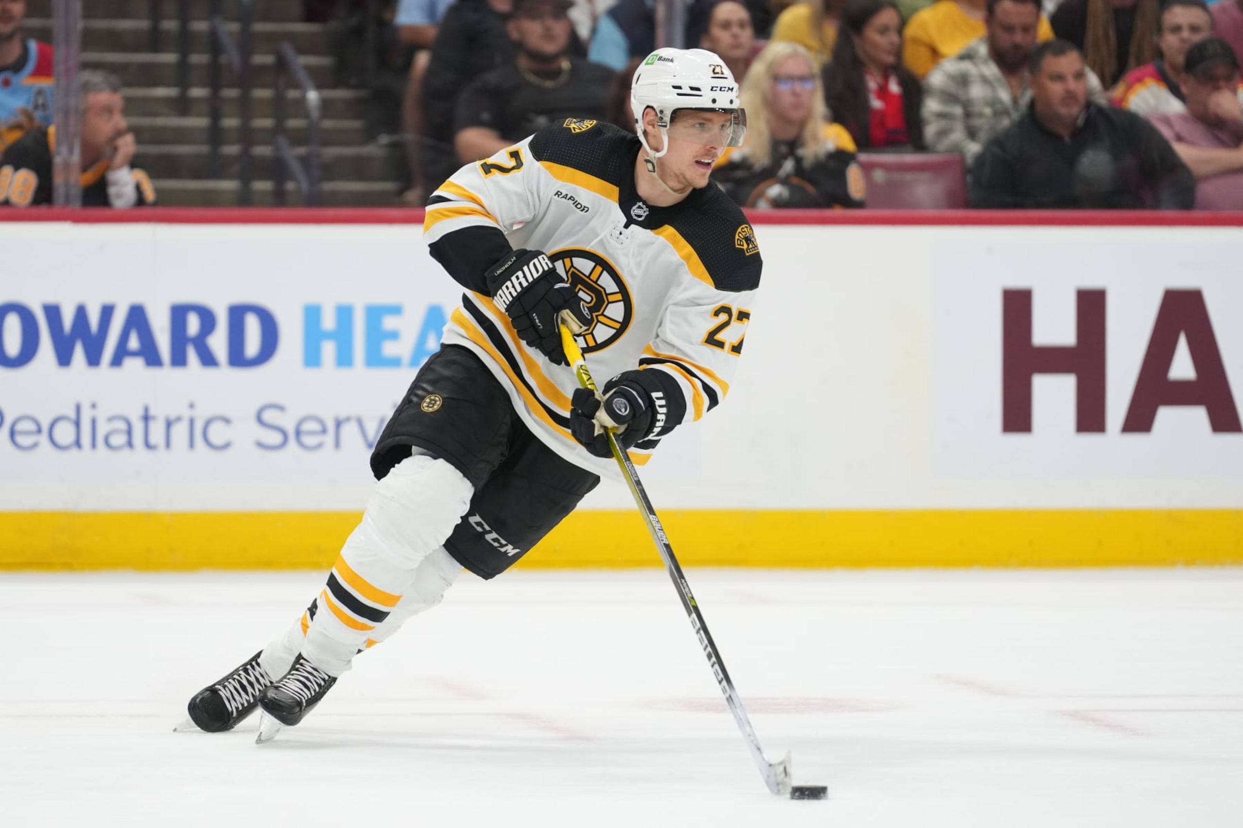 SUNRISE, FL - APRIL 23: Boston Bruins defenseman Hampus Lindholm (27) brings the puck forward during a power play in the second period during game six of the first round of the Eastern Conference Playoffs between the Boston Bruins and the Florida Panthers on Friday, April 28, 2023 at FLA Live Arena in Sunrise, Fla (Photo by Peter Joneleit/Icon Sportswire via Getty Images) SUNRISE, FL - APRIL 23: Boston Bruins defenseman Hampus Lindholm (27) brings the puck forward during a power play in the second period during game six of the first round of the Eastern Conference Playoffs between the Boston Bruins and the Florida Panthers on Friday, April 28, 2023 at FLA Live Arena in Sunrise, Fla (Photo by Peter Joneleit/Icon Sportswire via Getty Images)