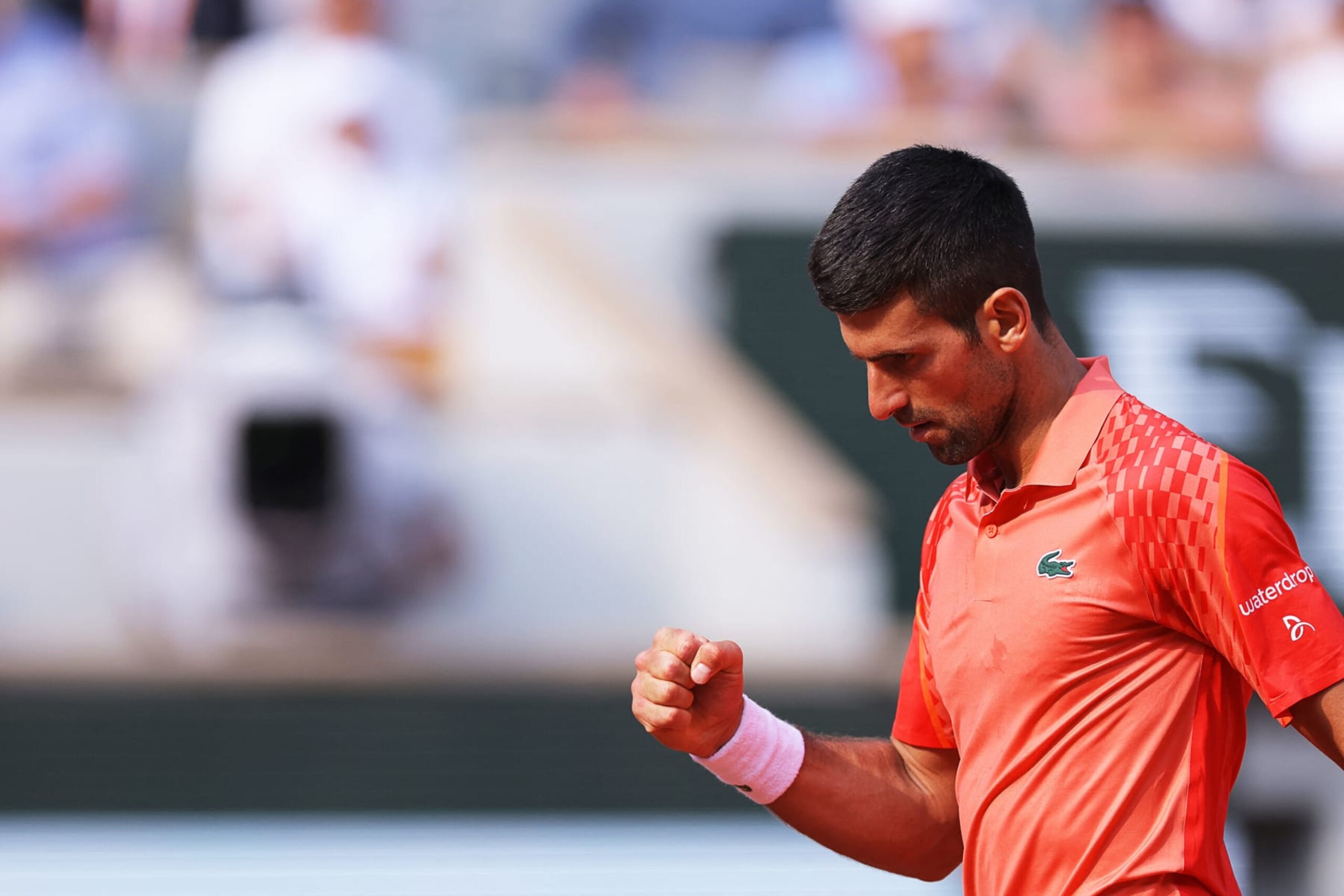 Serbia's Novak Djokovic celebrates a point against Russia's Karen Khachanov during their men's singles quarter final match on day ten of the Roland-Garros Open tennis tournament at the Court Philippe-Chatrier in Paris on June 6, 2023. (Photo by Thomas SAMSON / AFP) (Photo by THOMAS SAMSON/AFP via Getty Images) Serbia's Novak Djokovic celebrates a point against Russia's Karen Khachanov during their men's singles quarter final match on day ten of the Roland-Garros Open tennis tournament at the Court Philippe-Chatrier in Paris on June 6, 2023. (Photo by Thomas SAMSON / AFP) (Photo by THOMAS SAMSON/AFP via Getty Images)