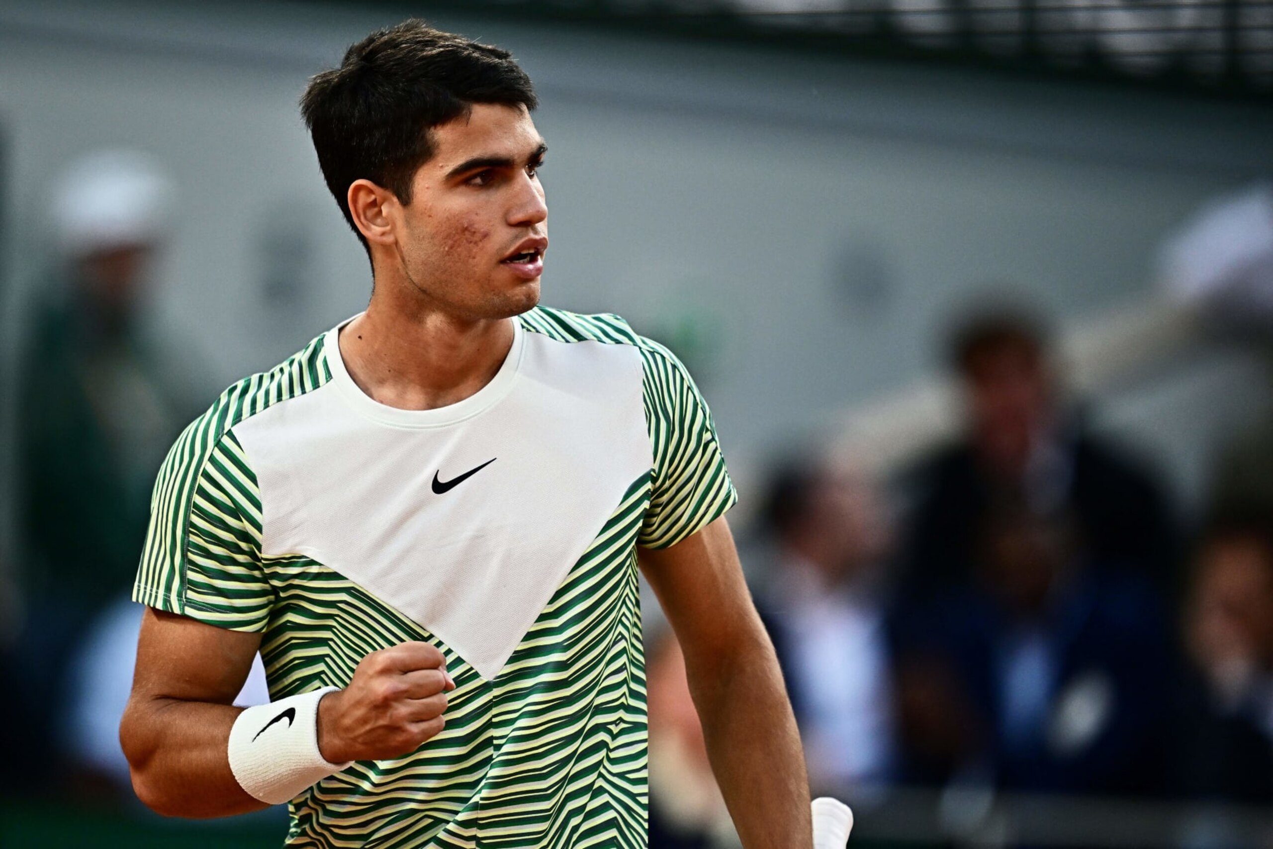 Spain's Carlos Alcaraz Garfia celebrates a point against Greece's Stefanos Tsitsipas during their men's singles quarter final match on day ten of the Roland-Garros Open tennis tournament at the Court Philippe-Chatrier in Paris on June 6, 2023. (Photo by JULIEN DE ROSA / AFP) (Photo by JULIEN DE ROSA/AFP via Getty Images)