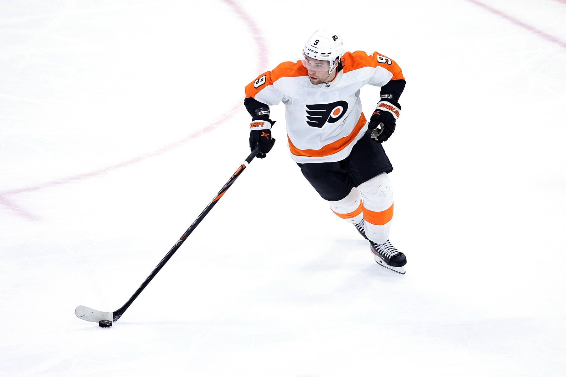 CHICAGO, ILLINOIS - APRIL 13: Ivan Provorov #9 of the Philadelphia Flyers controls the puck during a game against the Chicago Blackhawks at the United Center on April 13, 2023 in Chicago, Illinois.  The Flyers defeated the Blackhawks 5-4 in overtime. (Photo by Stacy Revere/Getty Images)