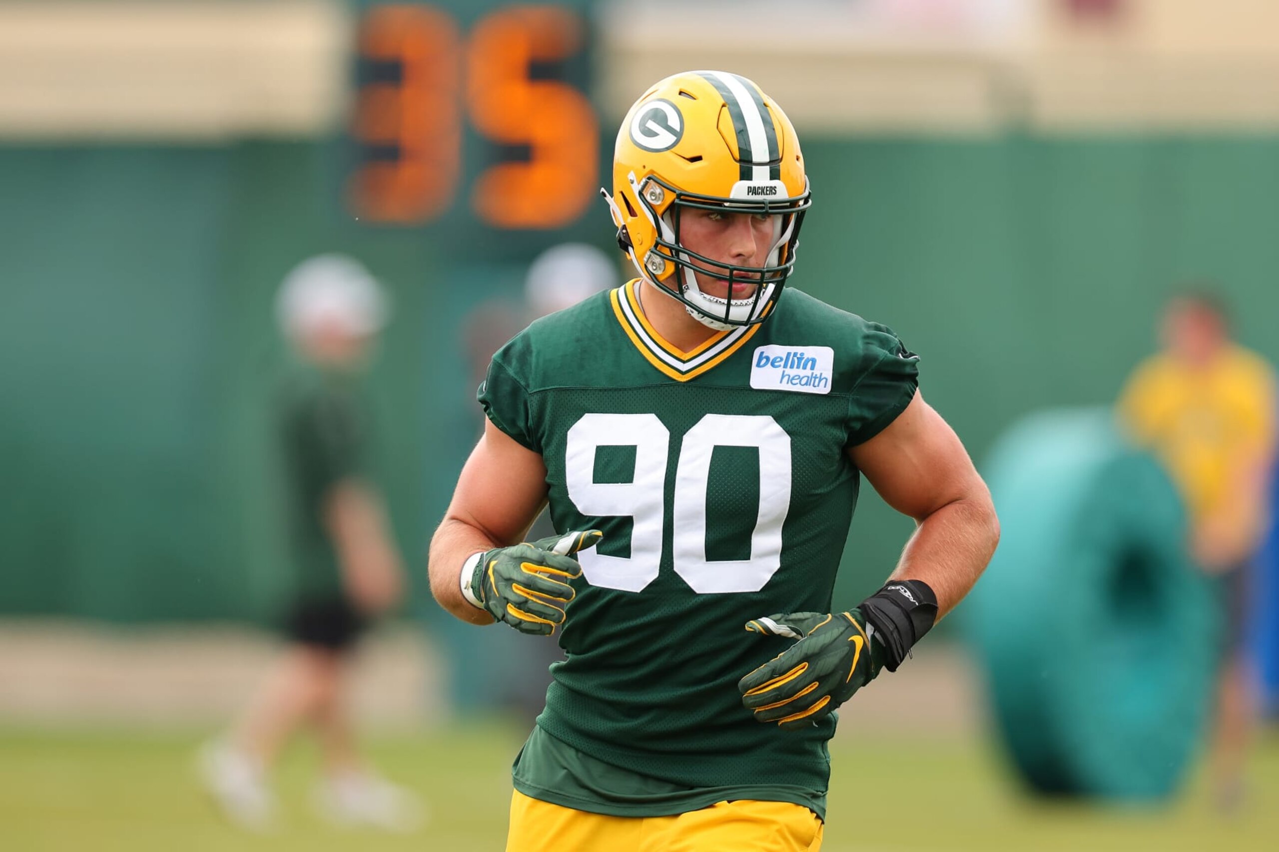 ASHWAUBENON, WISCONSIN - MAY 31: Lukas Van Ness #90 of the Green Bay Packers participates in an OTA practice session at Don Hutson Center on May 31, 2023 in Ashwaubenon, Wisconsin. (Photo by Stacy Revere/Getty Images)