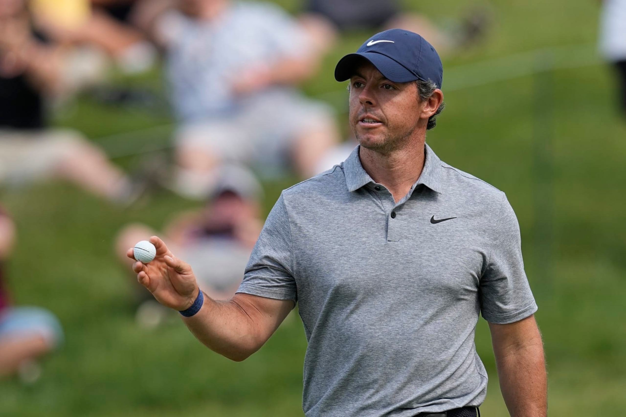 Rory McIlroy, of Northern Ireland, reacts after a birdie on the 17th hole during the third round of the Memorial golf tournament Saturday, June 3, 2023, in Dublin, Ohio. (AP Photo/Darron Cummings)