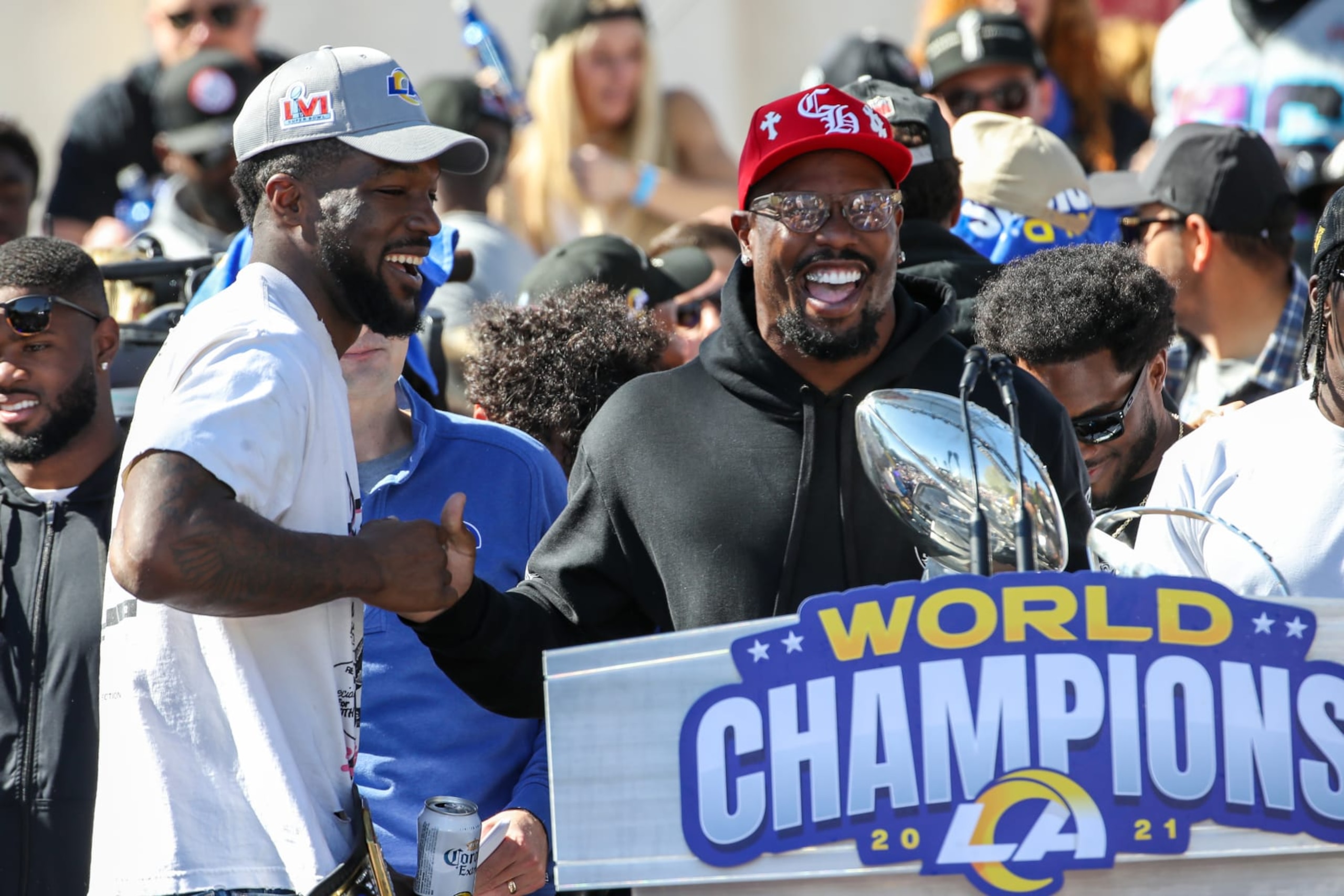 LOS ANGELES, CA - FEBRUARY 16: Los Angeles Rams outside linebacker Von Miller #40 shakes Los Angeles Rams outside linebacker Leonard Floyd #54 hand during the Los Angeles Rams Super Bowl LVI Championship parade on February 16, 2022, at the Los Angeles Memorial Coliseum in Los Angeles, CA. (Photo by Jevone Moore/Icon Sportswire via Getty Images)