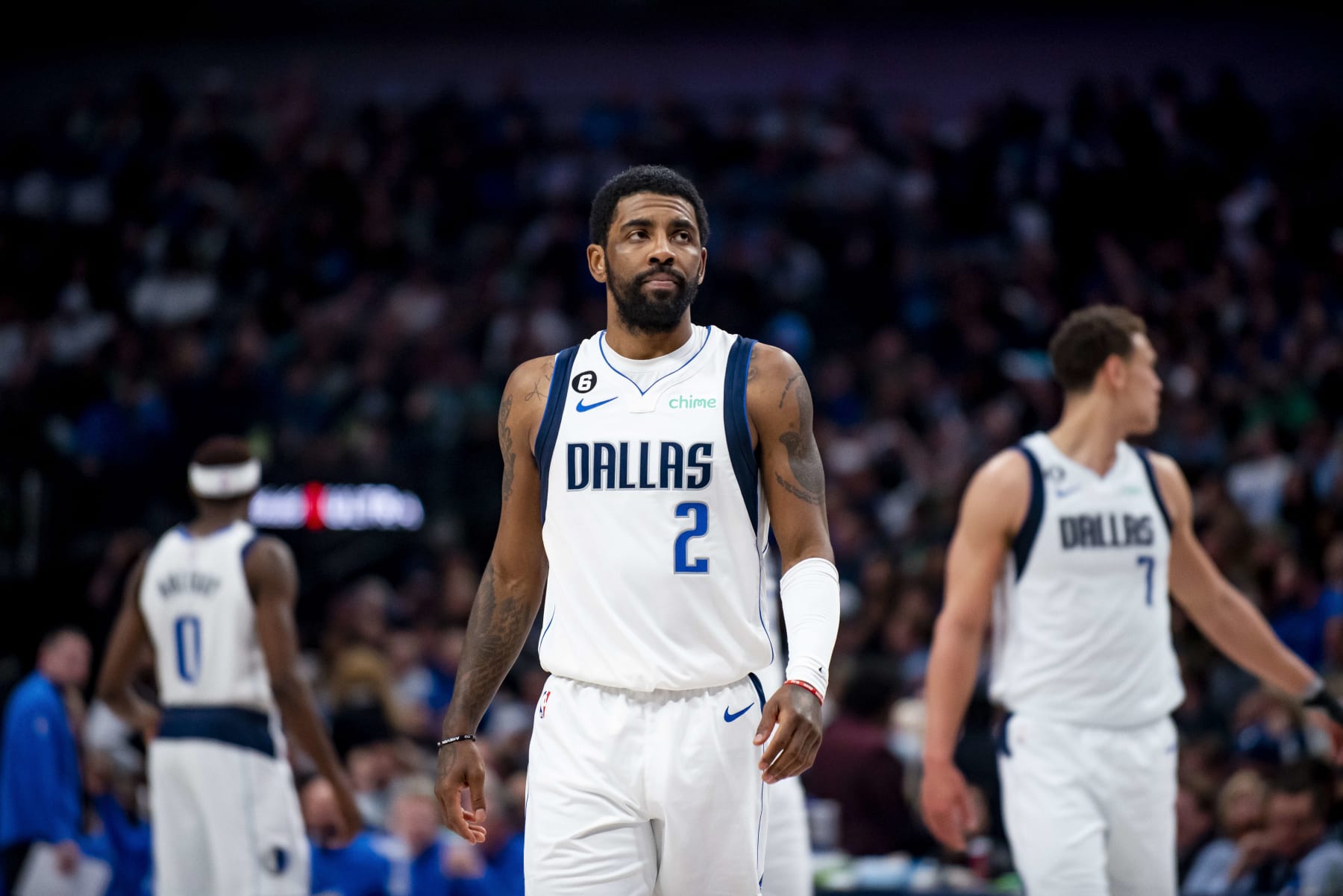 Dallas Mavericks guard Kyrie Irving (2) walks down the floor in the first half of an NBA basketball game against the San Antonio Spurs on Thursday, Feb. 23, 2023, in Dallas. (AP Photo/Emil T. Lippe)