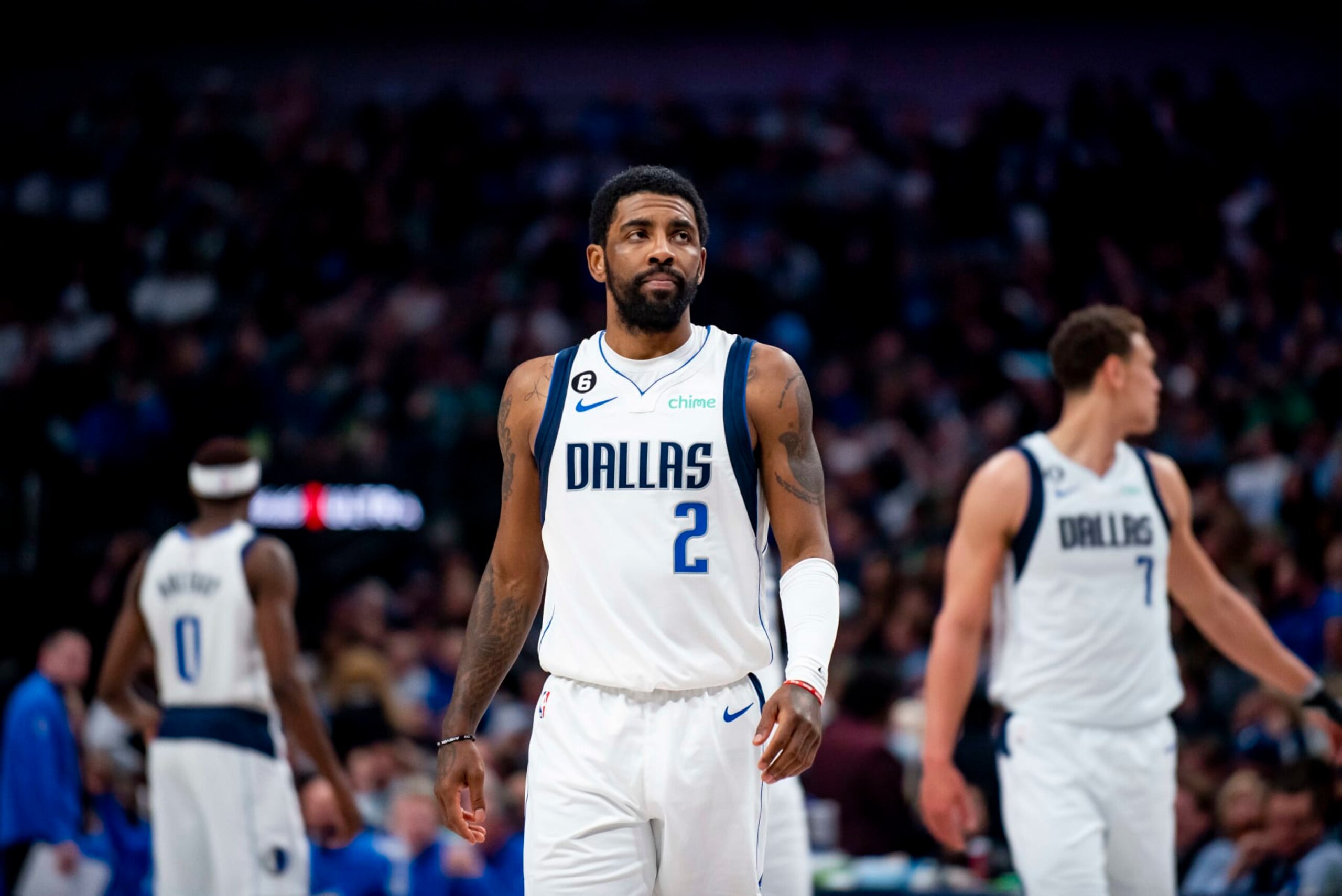 Dallas Mavericks guard Kyrie Irving (2) walks down the floor in the first half of an NBA basketball game against the San Antonio Spurs on Thursday, Feb. 23, 2023, in Dallas. (AP Photo/Emil T. Lippe)