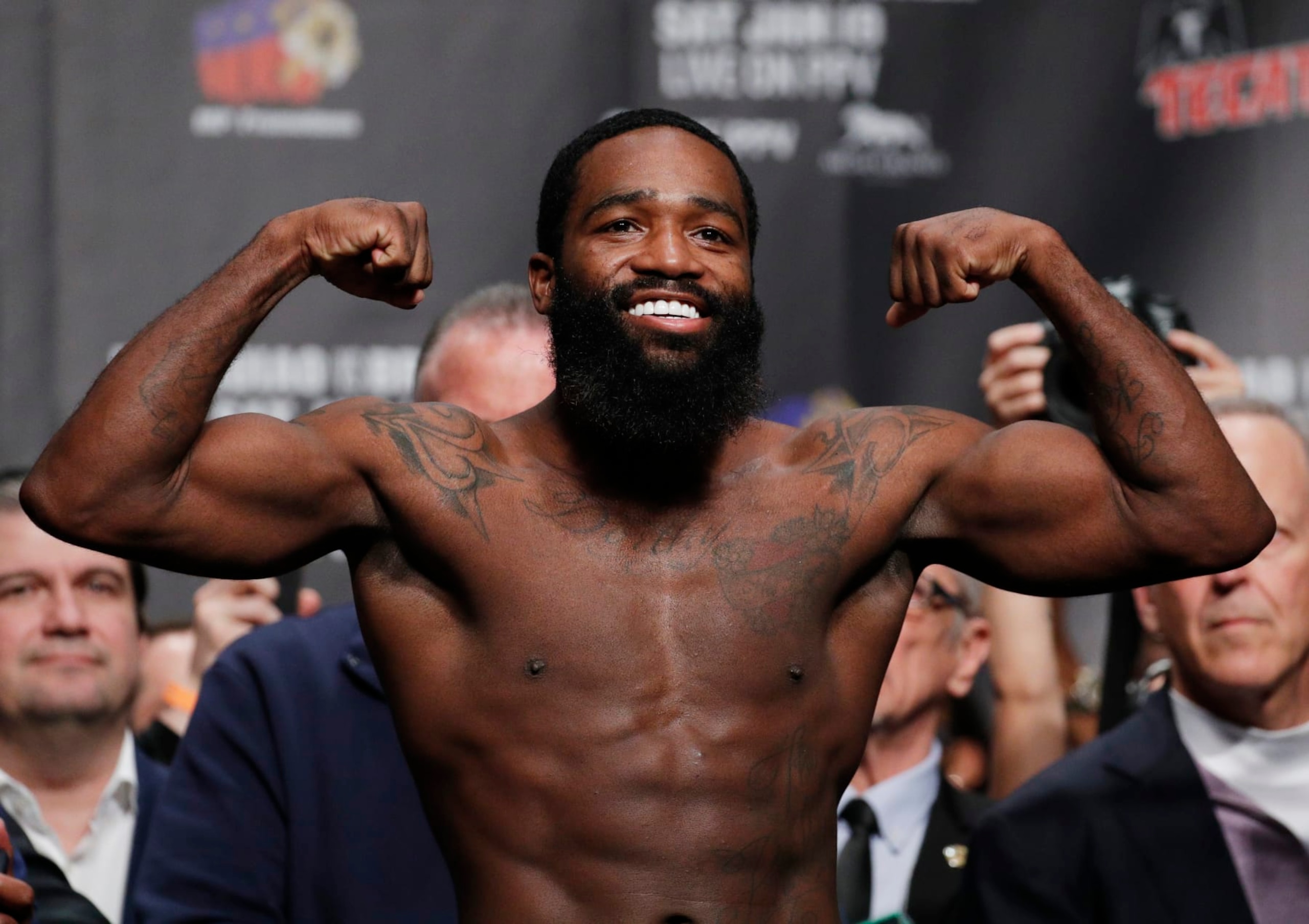 Adrien Broner poses on the scale during a weigh-in Friday, Jan. 18, 2019, in Las Vegas. Broner is scheduled to fight Manny Pacquiao in a welterweight championship boxing bout Saturday. (AP Photo/John Locher)