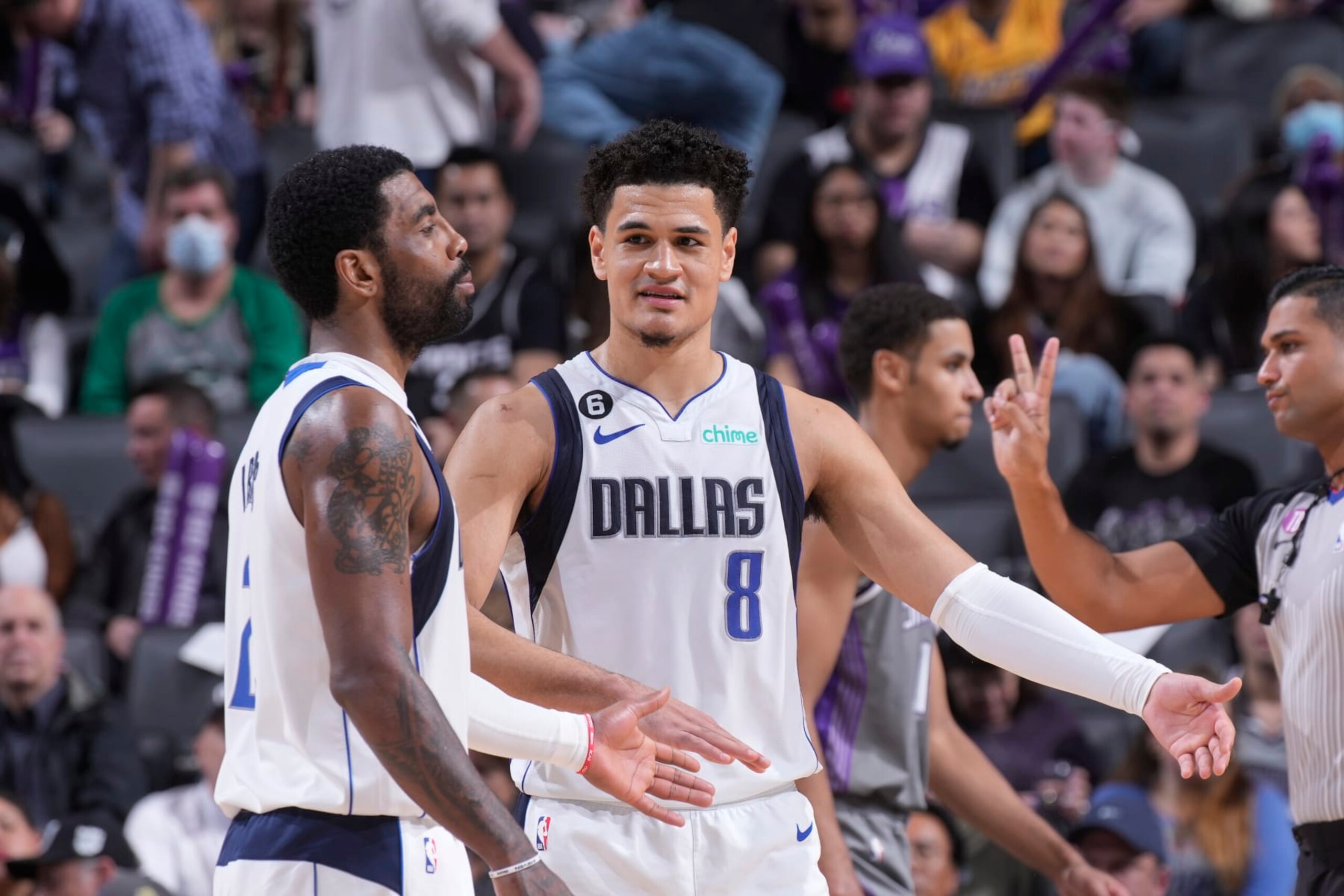 SACRAMENTO, CA - FEBRUARY 10: Kyrie Irving #2 and Josh Green #8 of the Dallas Mavericks talk on during the game against the Sacramento Kings on February 10, 2023 at Golden 1 Center in Sacramento, California. NOTE TO USER: User expressly acknowledges and agrees that, by downloading and or using this photograph, User is consenting to the terms and conditions of the Getty Images Agreement. Mandatory Copyright Notice: Copyright 2023 NBAE (Photo by Rocky Widner/NBAE via Getty Images)