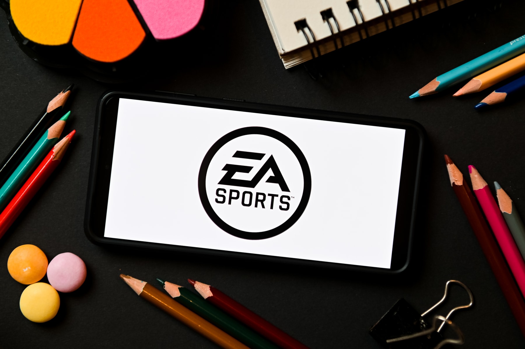 POLAND - 2022/12/17: In this photo illustration a EA Sports logo seen displayed on a smartphone. (Photo Illustration by Mateusz Slodkowski/SOPA Images/LightRocket via Getty Images)