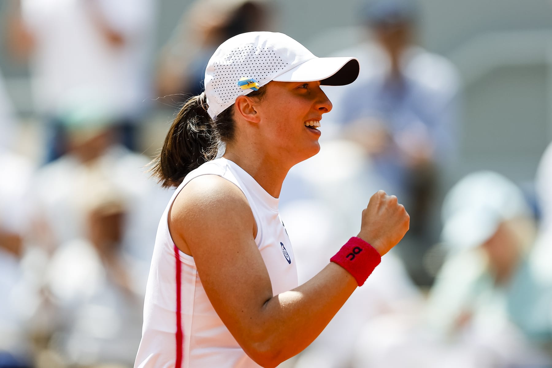 PARIS, FRANCE - JUNE 7: Iga Swiatek of Poland celebrates after winning Coco Gauff of USA during the Singles Quarter Final match on Day Eleven of the 2023 French Open at Roland Garros on June 7, 2023 in Paris, France. (Photo by Antonio Borga/Eurasia Sport Images/Getty Images)