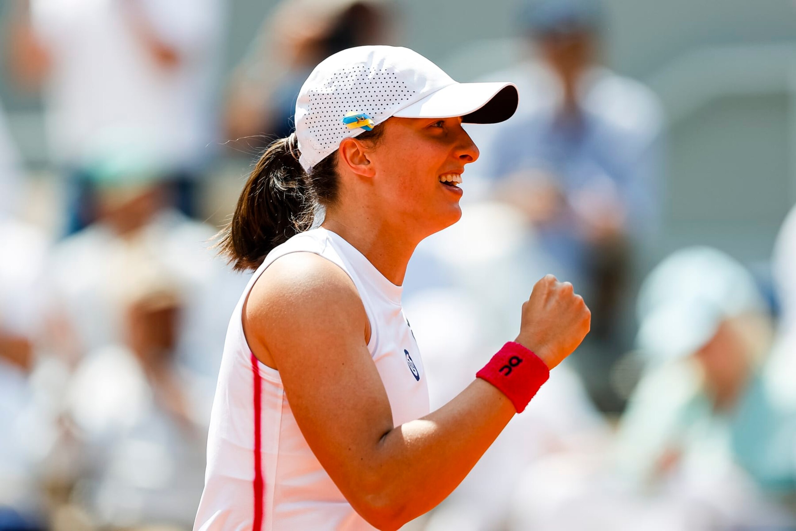 PARIS, FRANCE - JUNE 7: Iga Swiatek of Poland celebrates after winning Coco Gauff of USA during the Singles Quarter Final match on Day Eleven of the 2023 French Open at Roland Garros on June 7, 2023 in Paris, France. (Photo by Antonio Borga/Eurasia Sport Images/Getty Images)