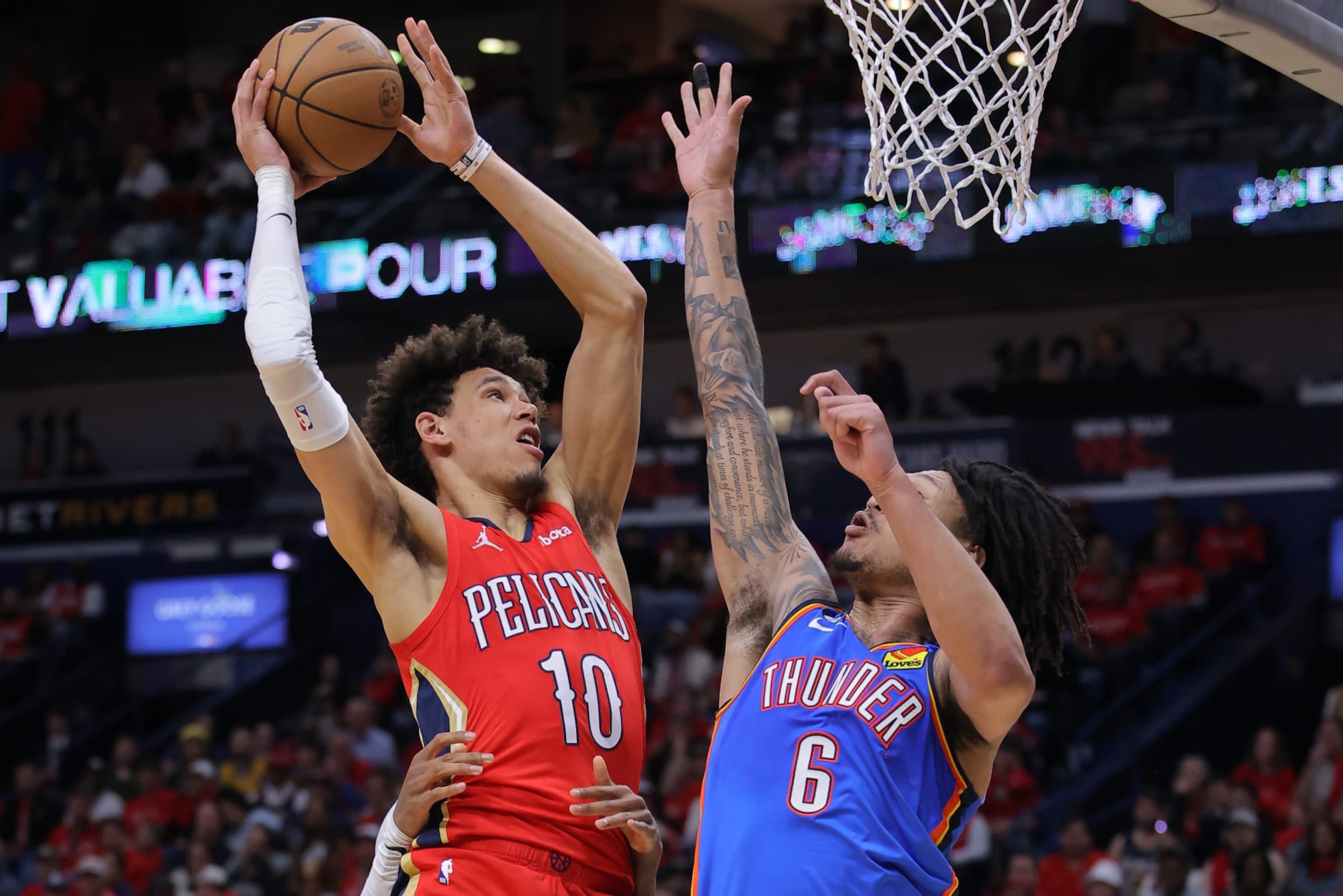 NEW ORLEANS, LOUISIANA - APRIL 12: Jaxson Hayes #10 of the New Orleans Pelicans shoots against Jaylin Williams #6 of the Oklahoma City Thunder during the second half at the Smoothie King Center on April 12, 2023 in New Orleans, Louisiana. NOTE TO USER: User expressly acknowledges and agrees that, by downloading and or using this Photograph, user is consenting to the terms and conditions of the Getty Images License Agreement. (Photo by Jonathan Bachman/Getty Images) NEW ORLEANS, LOUISIANA - APRIL 12: Jaxson Hayes #10 of the New Orleans Pelicans shoots against Jaylin Williams #6 of the Oklahoma City Thunder during the second half at the Smoothie King Center on April 12, 2023 in New Orleans, Louisiana. NOTE TO USER: User expressly acknowledges and agrees that, by downloading and or using this Photograph, user is consenting to the terms and conditions of the Getty Images License Agreement. (Photo by Jonathan Bachman/Getty Images)
