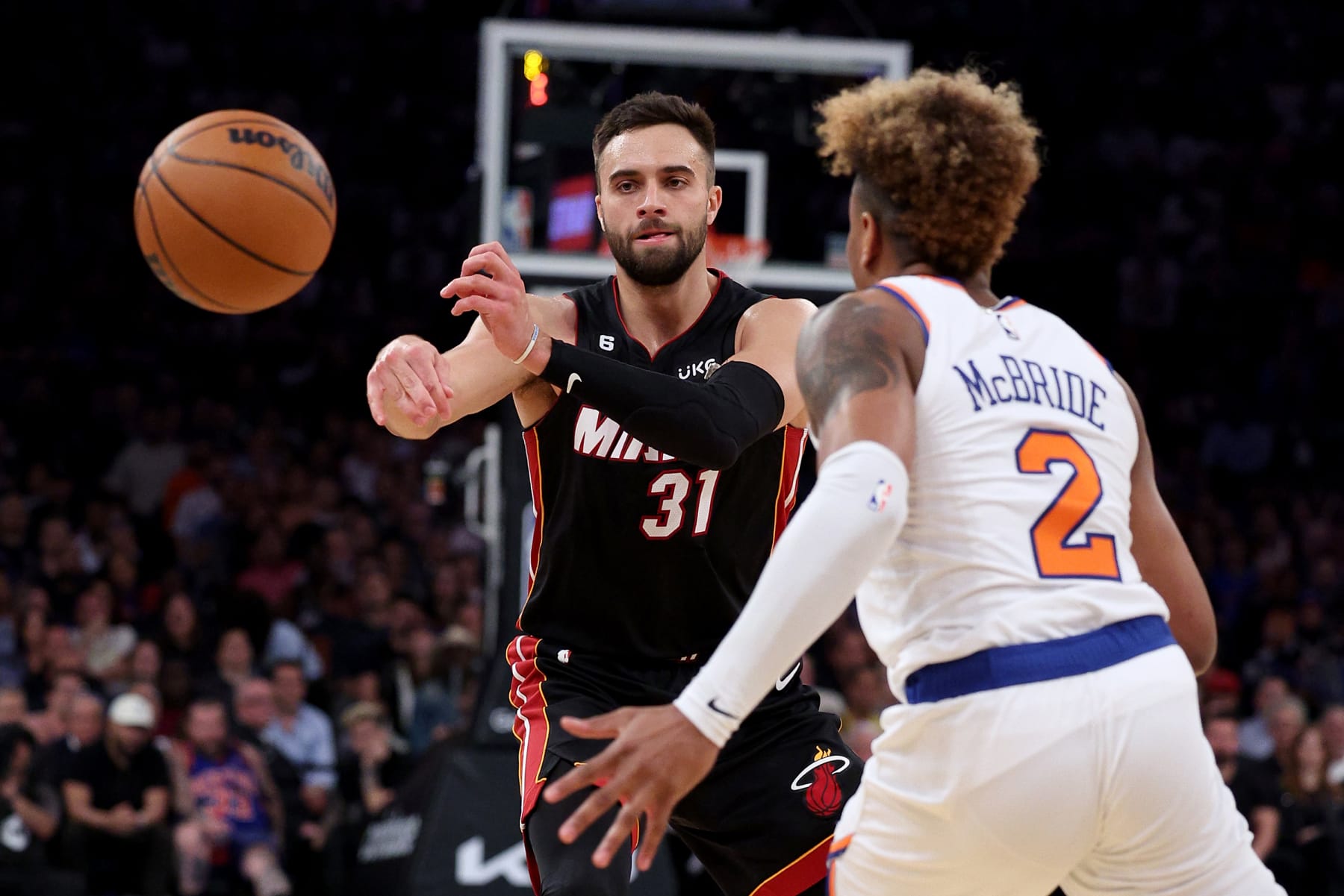 NEW YORK, NEW YORK - MAY 10: Max Strus #31 of the Miami Heat passes the ball against Miles McBride #2 of the New York Knicks during the second quarter in game five of the Eastern Conference Semifinals in the 2023 NBA Playoffs at Madison Square Garden on May 10, 2023 in New York City. NOTE TO USER: User expressly acknowledges and agrees that, by downloading and or using this photograph, User is consenting to the terms and conditions of the Getty Images License Agreement. (Photo by Elsa/Getty Images)