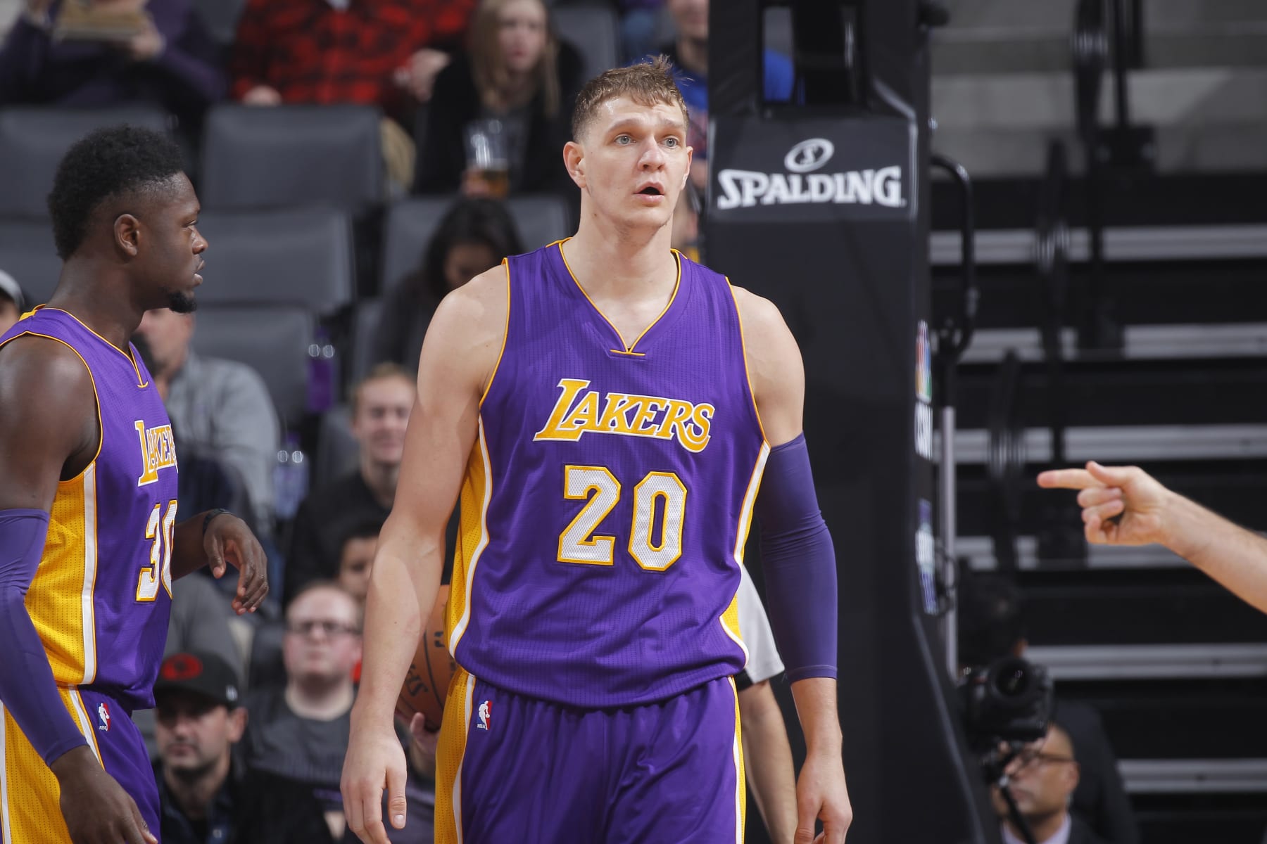 SACRAMENTO, CA - DECEMBER 12: Timofey Mozgov #20 of the Los Angeles Lakers looks on during the game against the Sacramento Kings on December 12, 2016 at Golden 1 Center in Sacramento, California. NOTE TO USER: User expressly acknowledges and agrees that, by downloading and or using this photograph, User is consenting to the terms and conditions of the Getty Images Agreement. Mandatory Copyright Notice: Copyright 2016 NBAE (Photo by Rocky Widner/NBAE via Getty Images)