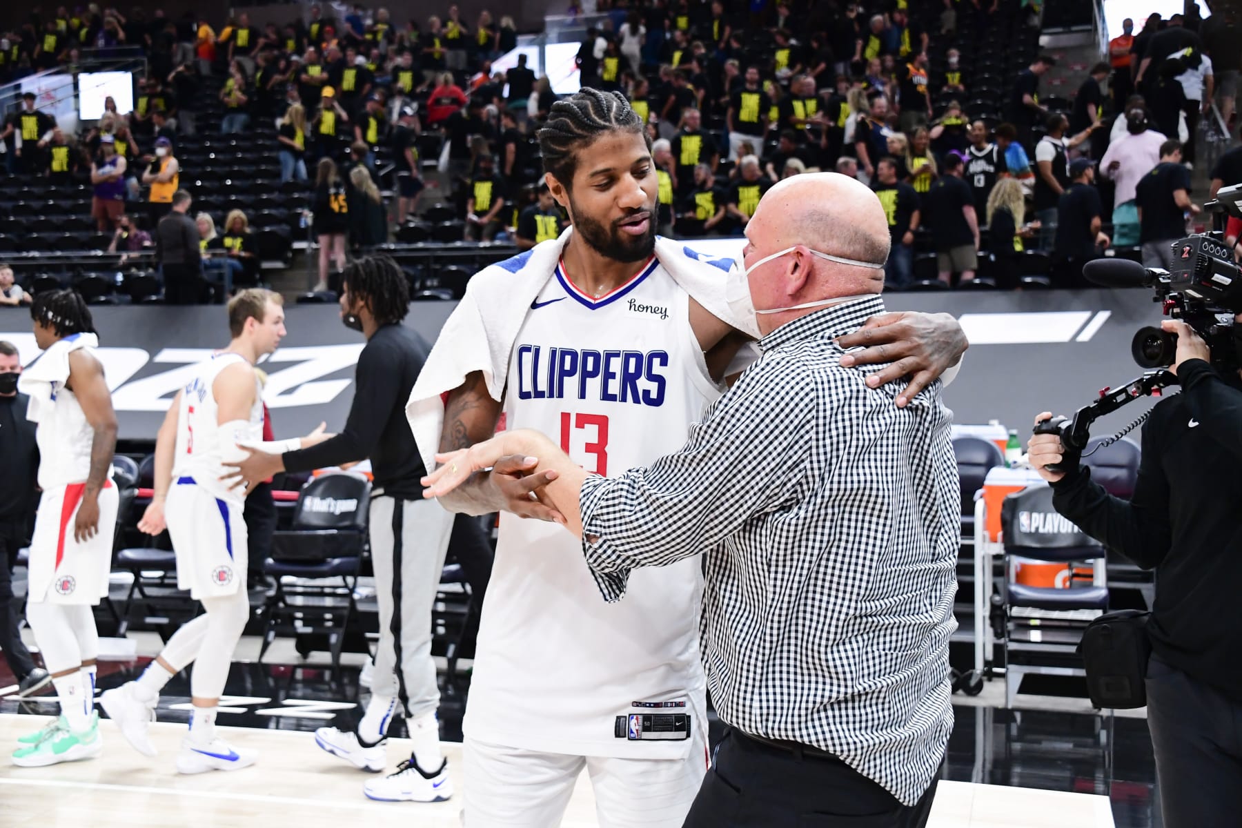 SALT LAKE CITY, UT - JUNE 16: Paul George #13 of the LA Clippers talks to Owner, Steve Ballmer of the LA Clippers after the game against the Utah Jazz during Round 2, Game 5 of the 2021 NBA Playoffs on June 16, 2021 at vivint.SmartHome Arena in Salt Lake City, Utah. NOTE TO USER: User expressly acknowledges and agrees that, by downloading and or using this Photograph, User is consenting to the terms and conditions of the Getty Images License Agreement. Mandatory Copyright Notice: Copyright 2021 NBAE (Photo by Adam Pantozzi/NBAE via Getty Images)