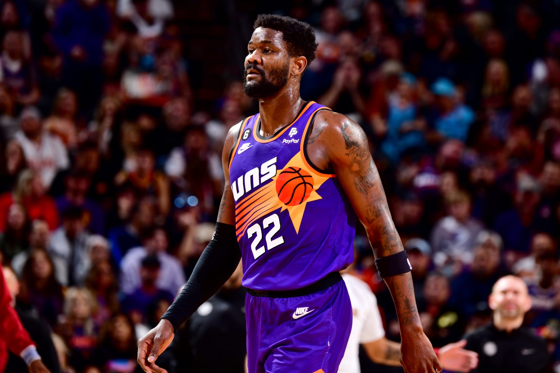 PHOENIX, AZ - MARCH 31: Deandre Ayton #22 of the Phoenix Suns looks on during the game against the Denver Nuggets  on March 31, 2022 at Footprint Center in Phoenix, Arizona. NOTE TO USER: User expressly acknowledges and agrees that, by downloading and or using this photograph, user is consenting to the terms and conditions of the Getty Images License Agreement. Mandatory Copyright Notice: Copyright 2022 NBAE (Photo by Barry Gossage/NBAE via Getty Images)