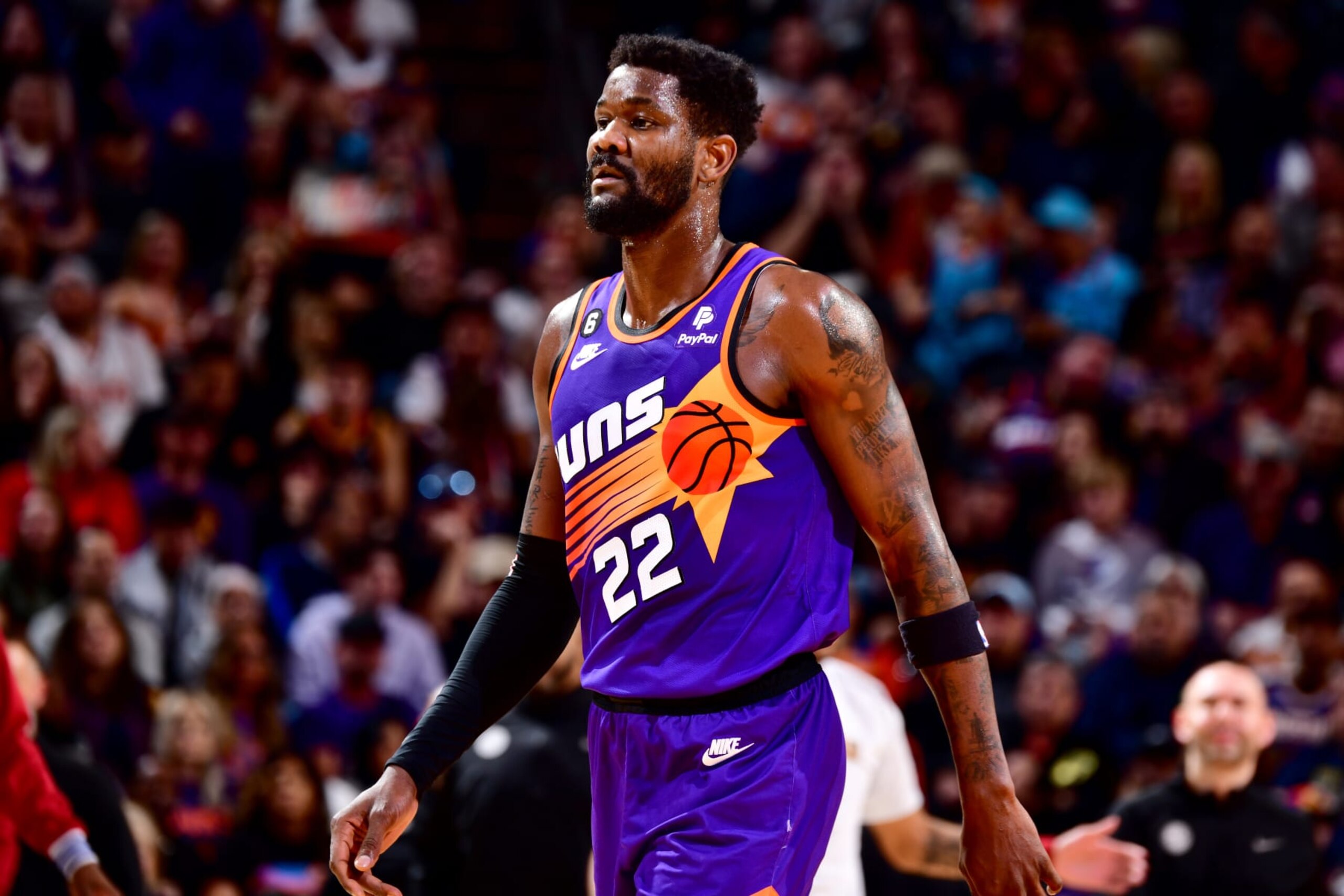 PHOENIX, AZ - MARCH 31: Deandre Ayton #22 of the Phoenix Suns looks on during the game against the Denver Nuggets  on March 31, 2022 at Footprint Center in Phoenix, Arizona. NOTE TO USER: User expressly acknowledges and agrees that, by downloading and or using this photograph, user is consenting to the terms and conditions of the Getty Images License Agreement. Mandatory Copyright Notice: Copyright 2022 NBAE (Photo by Barry Gossage/NBAE via Getty Images)