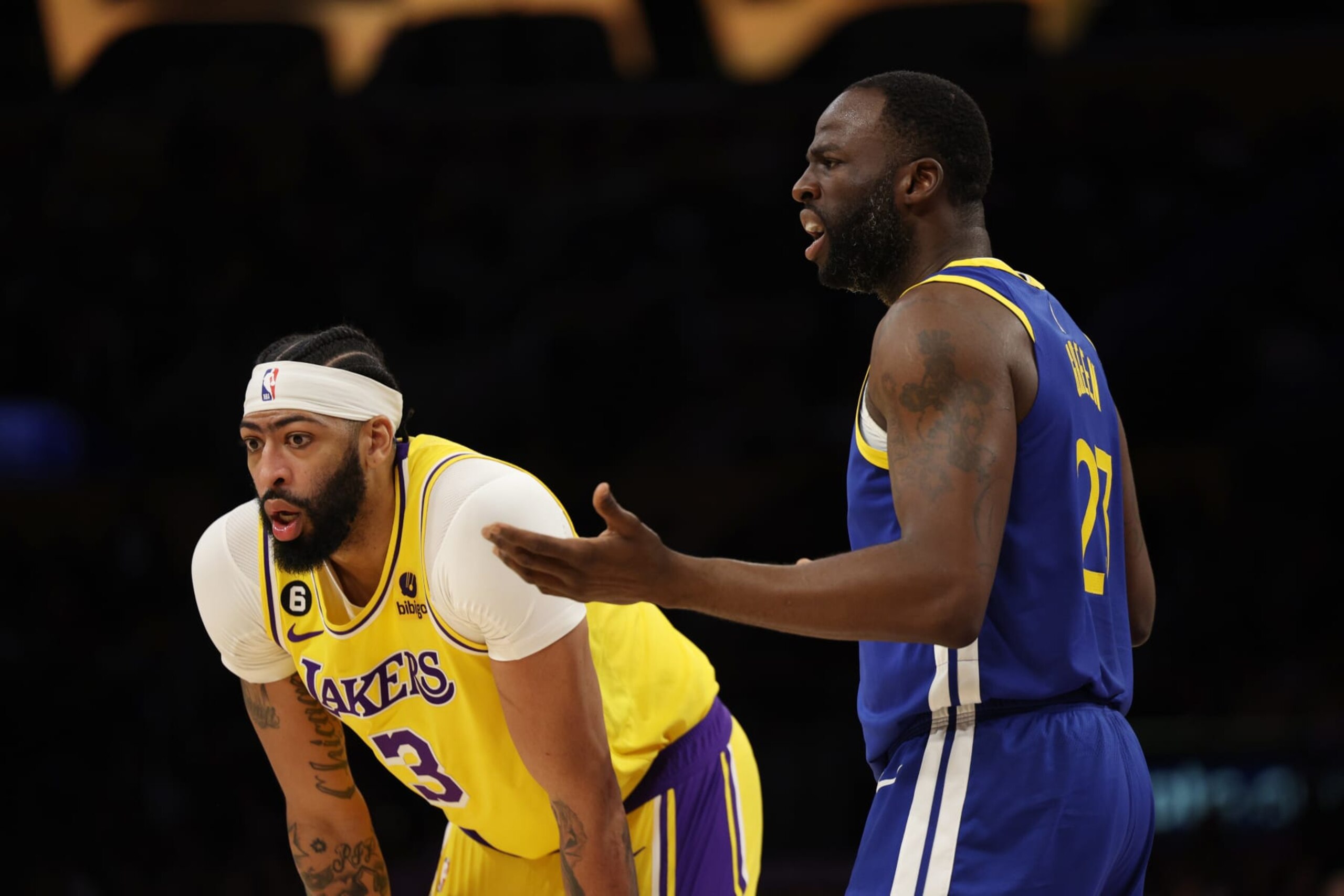 LOS ANGELES, CALIFORNIA - MAY 12: Draymond Green #23 of the Golden State Warriors reacts after being called for a foul as Anthony Davis #3 of the Los Angeles Lakers looks on during the first quarter in game six of the Western Conference Semifinal Playoffs at Crypto.com Arena on May 12, 2023 in Los Angeles, California. NOTE TO USER: User expressly acknowledges and agrees that, by downloading and or using this photograph, User is consenting to the terms and conditions of the Getty Images License Agreement. (Photo by Harry How/Getty Images)