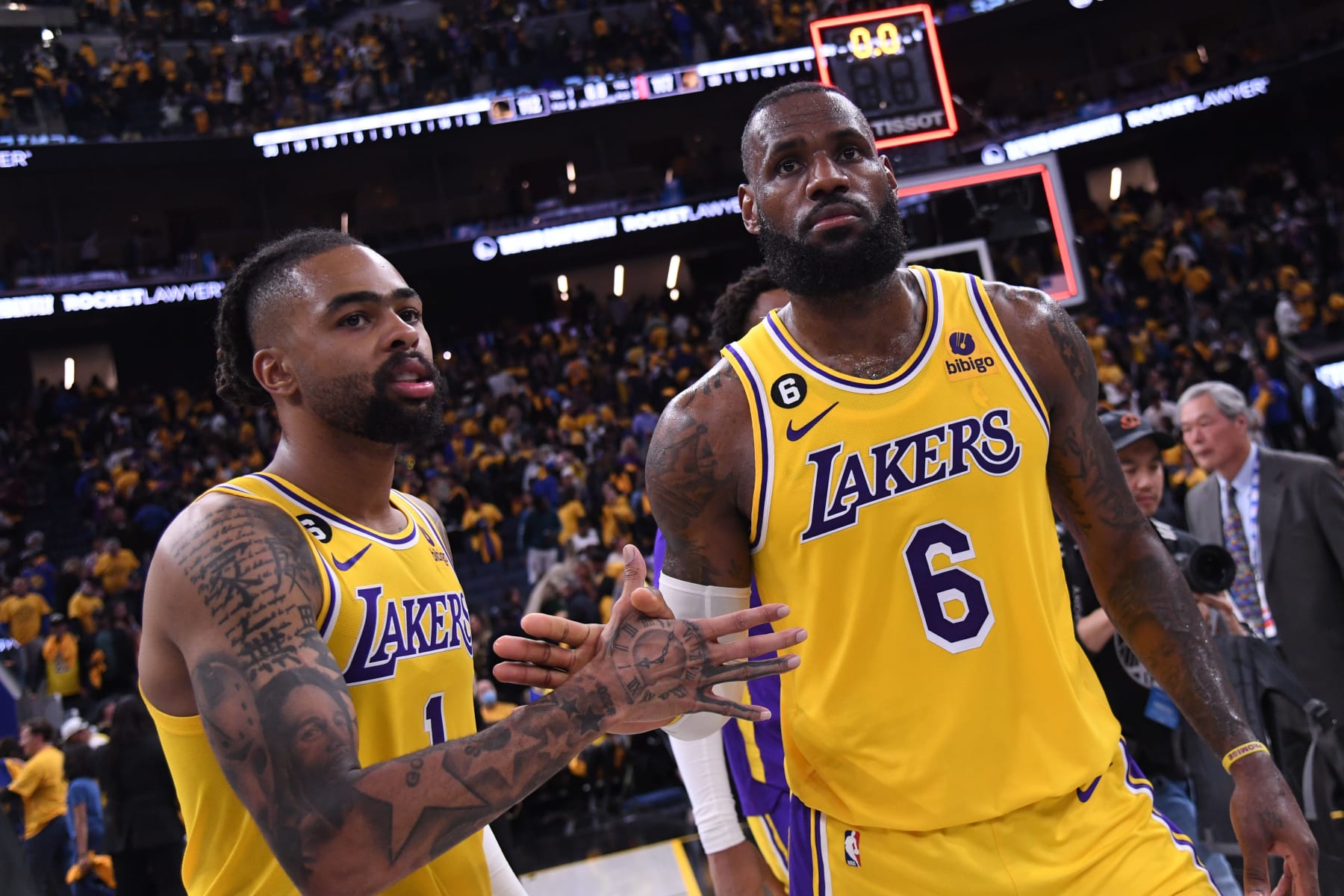 SAN FRANCISCO, CA - MAY 2: D'Angelo Russell #1 high fives LeBron James #6 of the Los Angeles Lakers after the game against the Golden State Warriors during Game One of the Western Conference Semi-Finals of the 2023 NBA Playoffs on May 2, 2023 at Chase Center in San Francisco, California. NOTE TO USER: User expressly acknowledges and agrees that, by downloading and or using this photograph, user is consenting to the terms and conditions of Getty Images License Agreement. Mandatory Copyright Notice: Copyright 2023 NBAE (Photo by Noah Graham/NBAE via Getty Images)