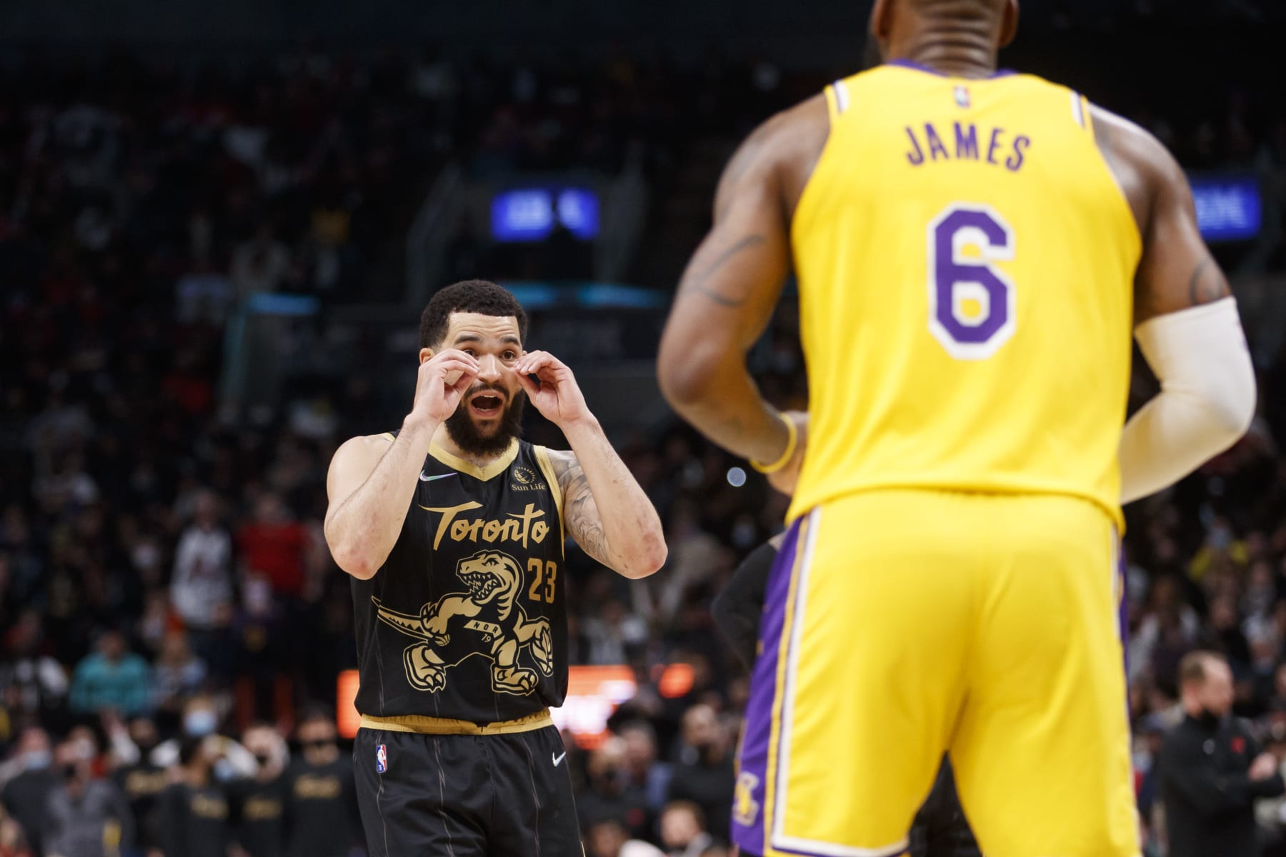 TORONTO, ON - MARCH 18: Fred VanVleet #23 of the Toronto Raptors talks with LeBron James #6 of the Los Angeles Lakers who was arguing a call during the second half of their NBA game at Scotiabank Arena on March 18, 2022 in Toronto, Canada. NOTE TO USER: User expressly acknowledges and agrees that, by downloading and or using this Photograph, user is consenting to the terms and conditions of the Getty Images License Agreement. (Photo by Cole Burston/Getty Images)