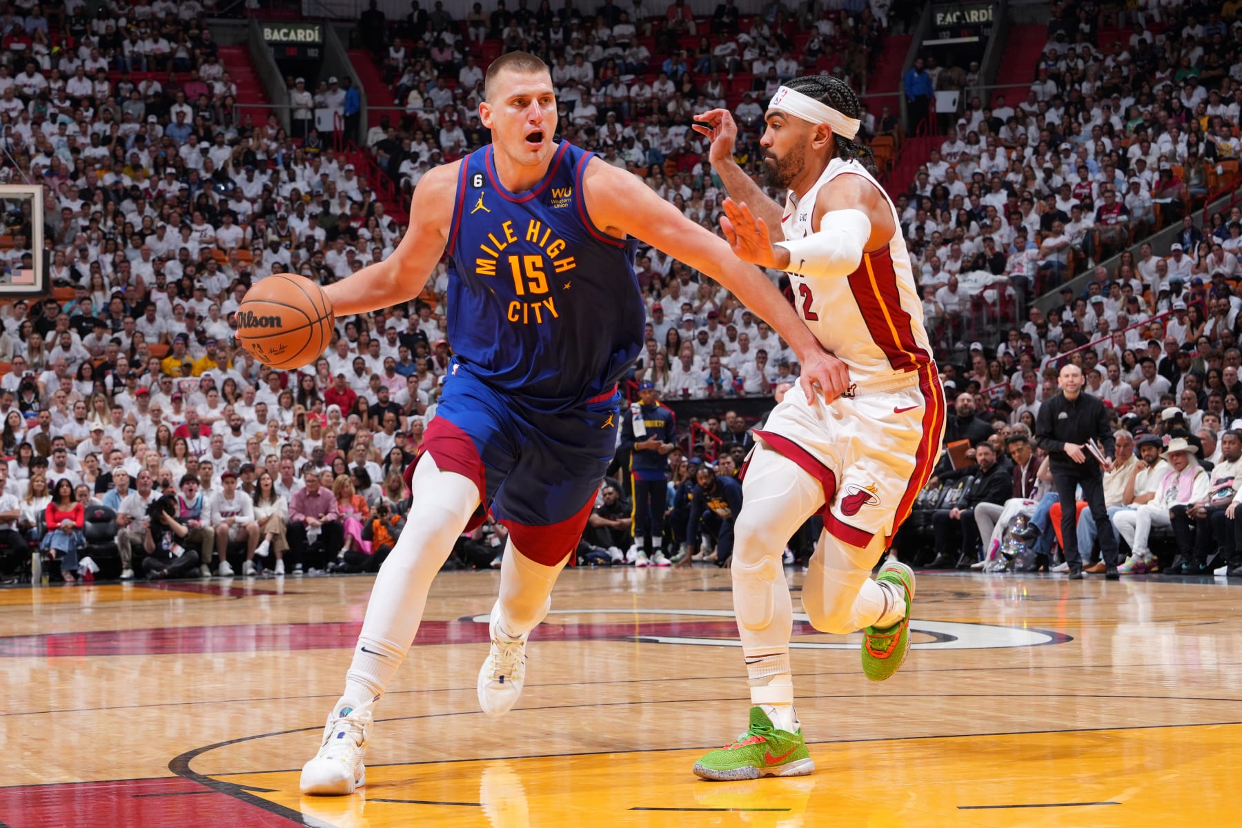 MIAMI, FL - JUNE 7: Nikola Jokic #15 of the Denver Nuggets dribbles the ball during Game Three of the 2023 NBA Finals on June 7, 2023 at Kaseya Center in Miami, Florida. NOTE TO USER: User expressly acknowledges and agrees that, by downloading and or using this Photograph, user is consenting to the terms and conditions of the Getty Images License Agreement. Mandatory Copyright Notice: Copyright 2023 NBAE (Photo by Jesse D. Garrabrant/NBAE via Getty Images)