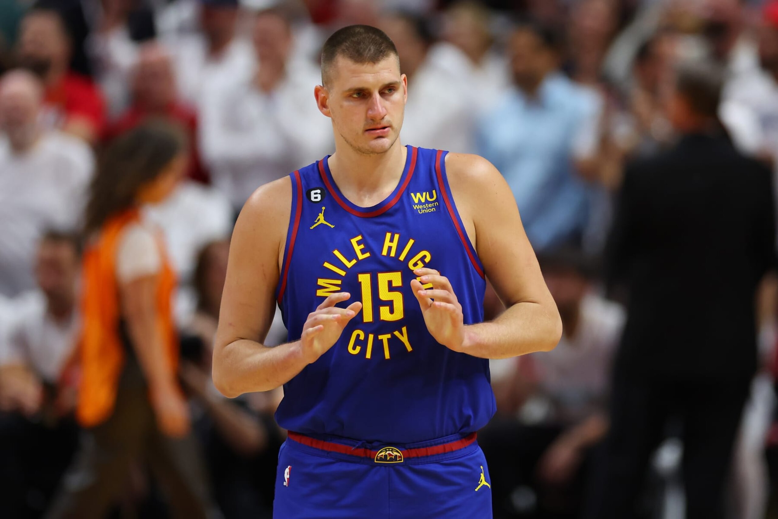 MIAMI, FLORIDA - JUNE 07: Nikola Jokic #15 of the Denver Nuggets looks on during the second quarter against the Miami Heat in Game Three of the 2023 NBA Finals at Kaseya Center on June 07, 2023 in Miami, Florida. NOTE TO USER: User expressly acknowledges and agrees that, by downloading and or using this photograph, User is consenting to the terms and conditions of the Getty Images License Agreement. (Photo by Mike Ehrmann/Getty Images)