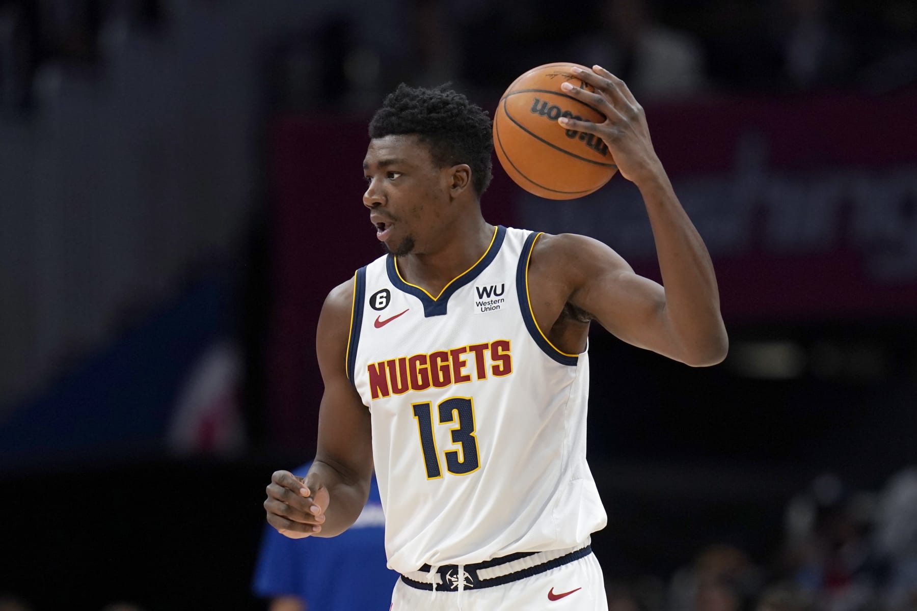 WASHINGTON, DC - MARCH 22: Thomas Bryant #13 of the Denver Nuggets looks to pass during the second half of the game against the Washington Wizards at Capital One Arena on March 22, 2023 in Washington, DC. NOTE TO USER: User expressly acknowledges and agrees that, by downloading and or using this photograph, User is consenting to the terms and conditions of the Getty Images License Agreement. (Photo by Jess Rapfogel/Getty Images)