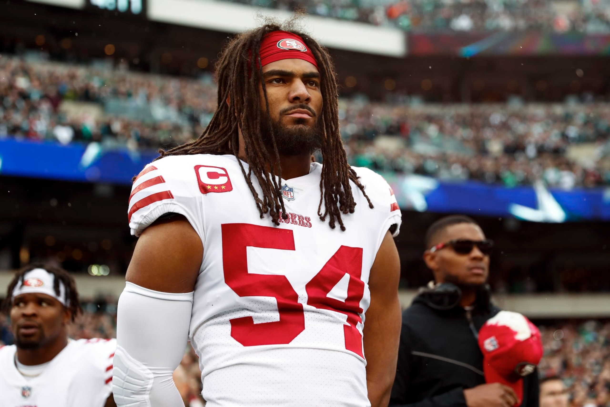 PHILADELPHIA, PA - JANUARY 29: Fred Warner #54 of the San Francisco 49ers stands on the sidelines during the national anthem prior to the NFC Championship NFL football game against the Philadelphia Eagles at Lincoln Financial Field on January 29, 2023 in Philadelphia, Pennsylvania. (Photo by Kevin Sabitus/Getty Images)
