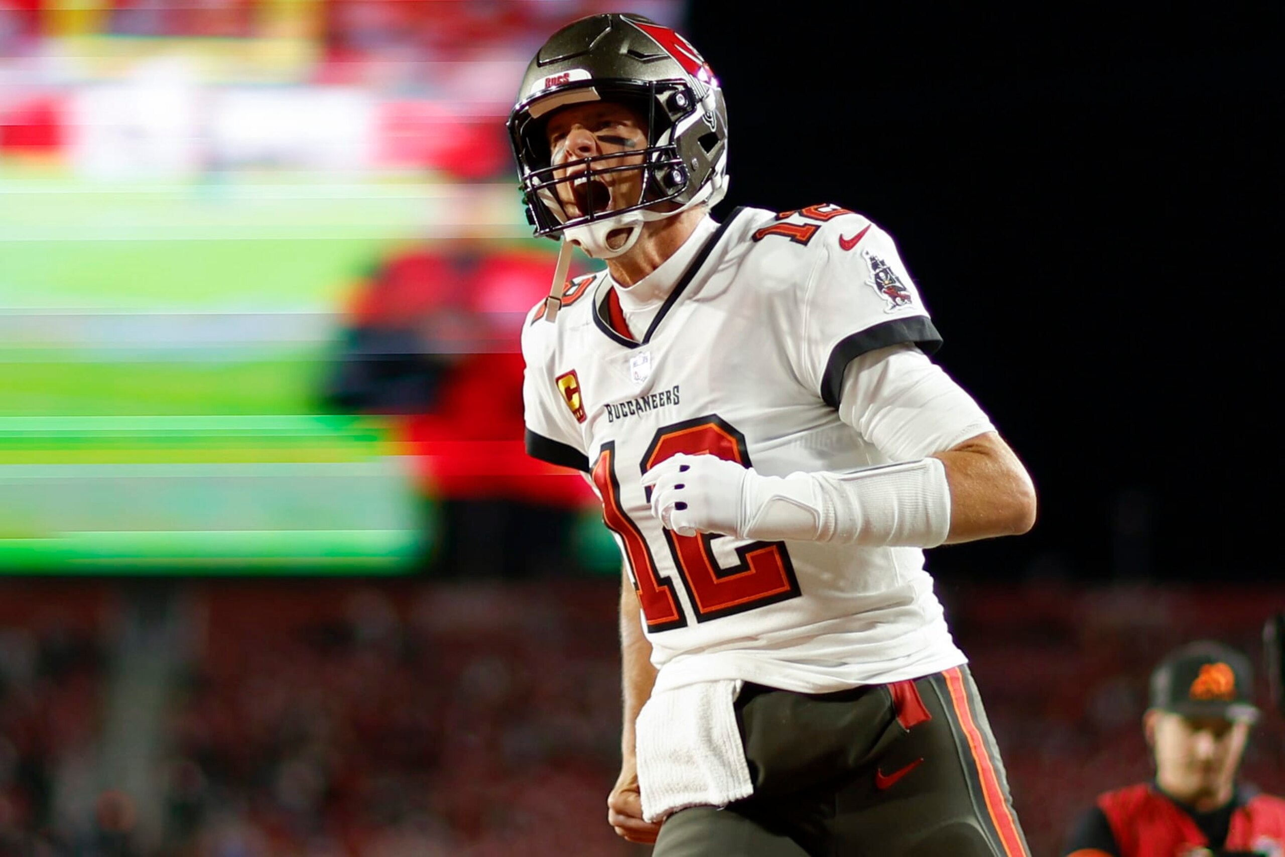 TAMPA, FLORIDA - JANUARY 16: Tom Brady #12 of the Tampa Bay Buccaneers warms up prior to a game against the Dallas Cowboys in the NFC Wild Card playoff game at Raymond James Stadium on January 16, 2023 in Tampa, Florida. (Photo by Mike Ehrmann/Getty Images) TAMPA, FLORIDA - JANUARY 16: Tom Brady #12 of the Tampa Bay Buccaneers warms up prior to a game against the Dallas Cowboys in the NFC Wild Card playoff game at Raymond James Stadium on January 16, 2023 in Tampa, Florida. (Photo by Mike Ehrmann/Getty Images)
