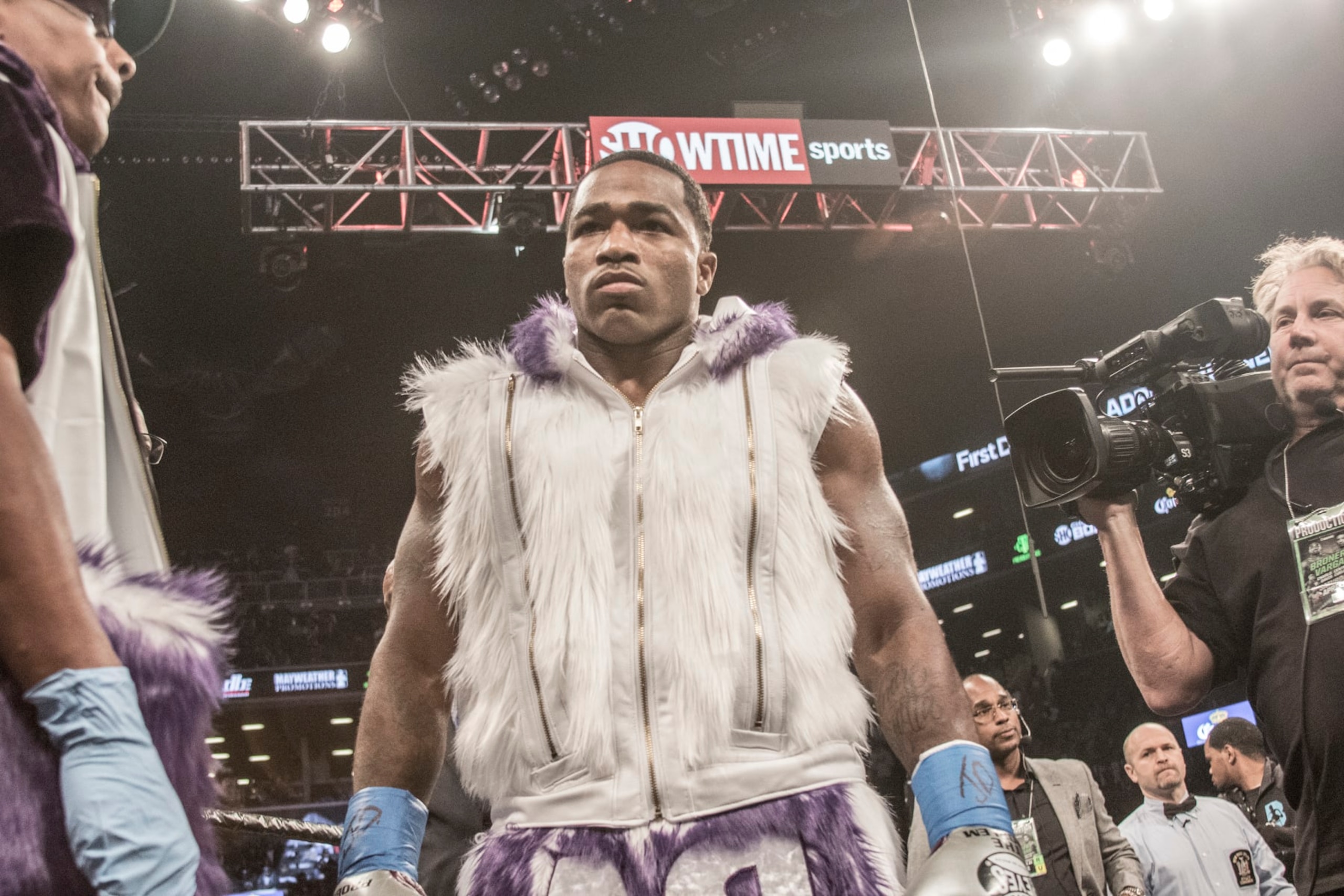 BROOKLYN, NY - APRIL 21: Adrien Broner ( purple and white trunks ) and Jesse Vargas ( white and gold trunks) fight to a Majority Draw in their Welterweight fight at Barclays Center on April 21, 2018 in New York City. (Photo by Bill Tompkins/Getty Images)