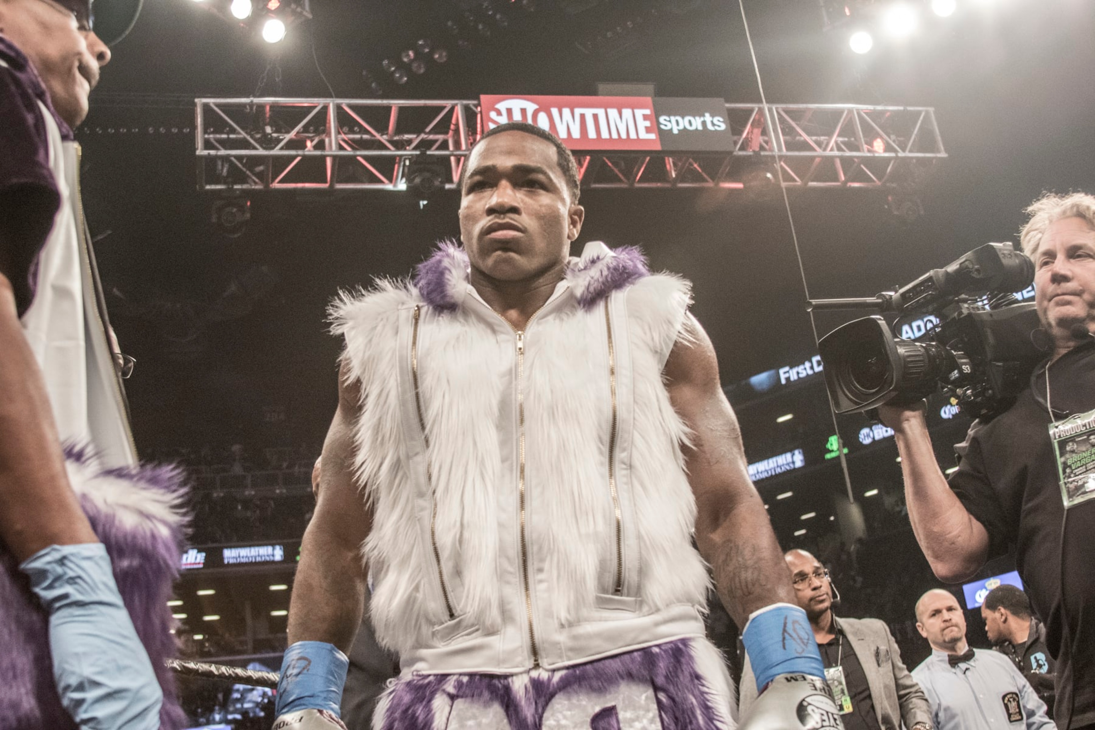 BROOKLYN, NY - APRIL 21: Adrien Broner ( purple and white trunks ) and Jesse Vargas ( white and gold trunks) fight to a Majority Draw in their Welterweight fight at Barclays Center on April 21, 2018 in New York City. (Photo by Bill Tompkins/Getty Images)