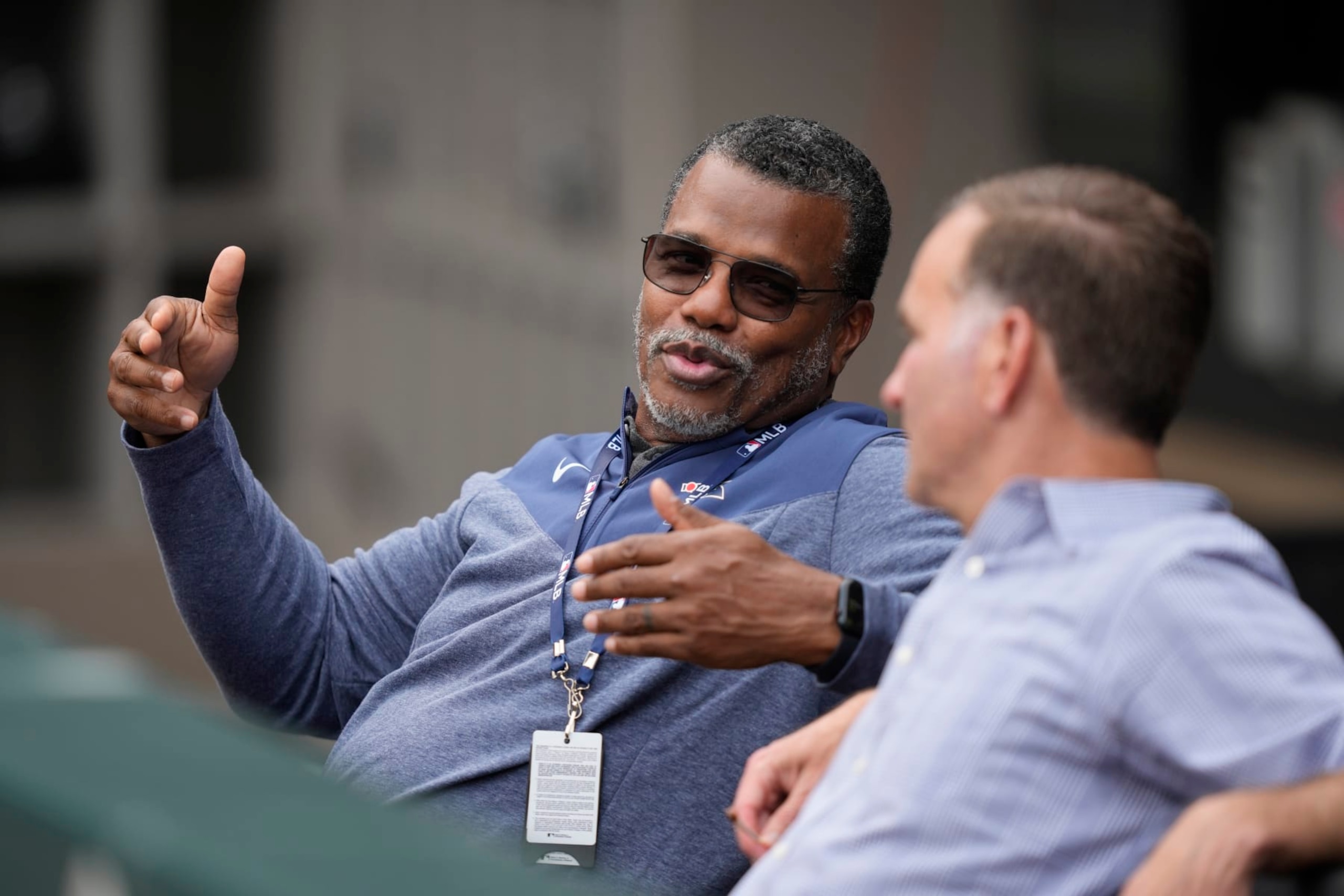 Chicago White Sox executive vice president Kenny Williams, left, talks with senior vice president-general manager Rick Hahn, right, during the team's batting practice before a baseball game against the Kansas City Royals, Friday, May 19, 2023, in Chicago. (AP Photo/Charles Rex Arbogast)